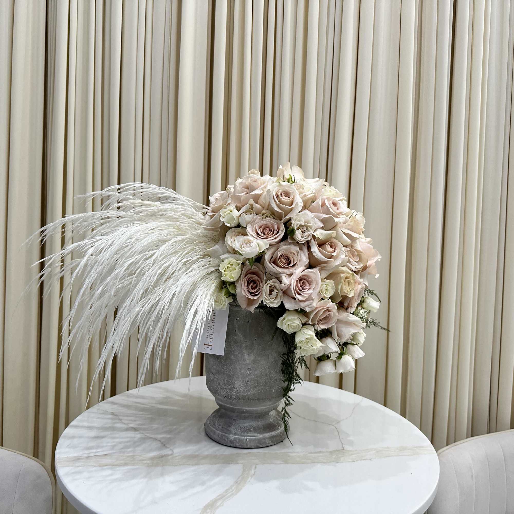 Bring the beauty of nature indoors with this stunning arrangement of ivory