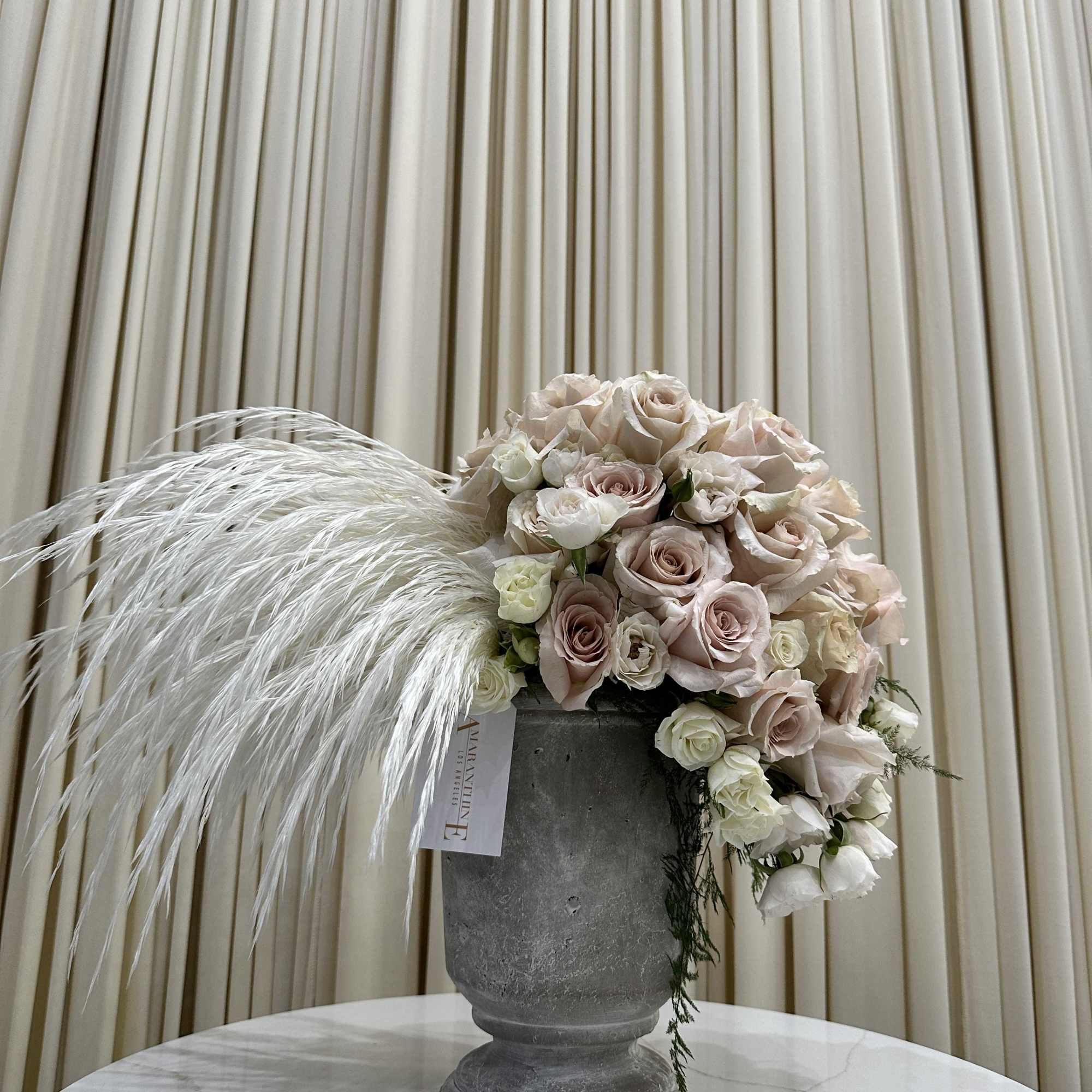 Bring the beauty of nature indoors with this stunning arrangement of ivory
