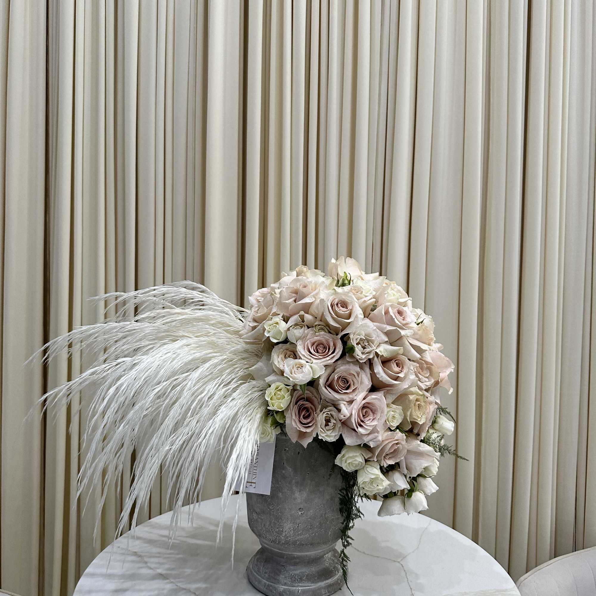 Bring the beauty of nature indoors with this stunning arrangement of ivory