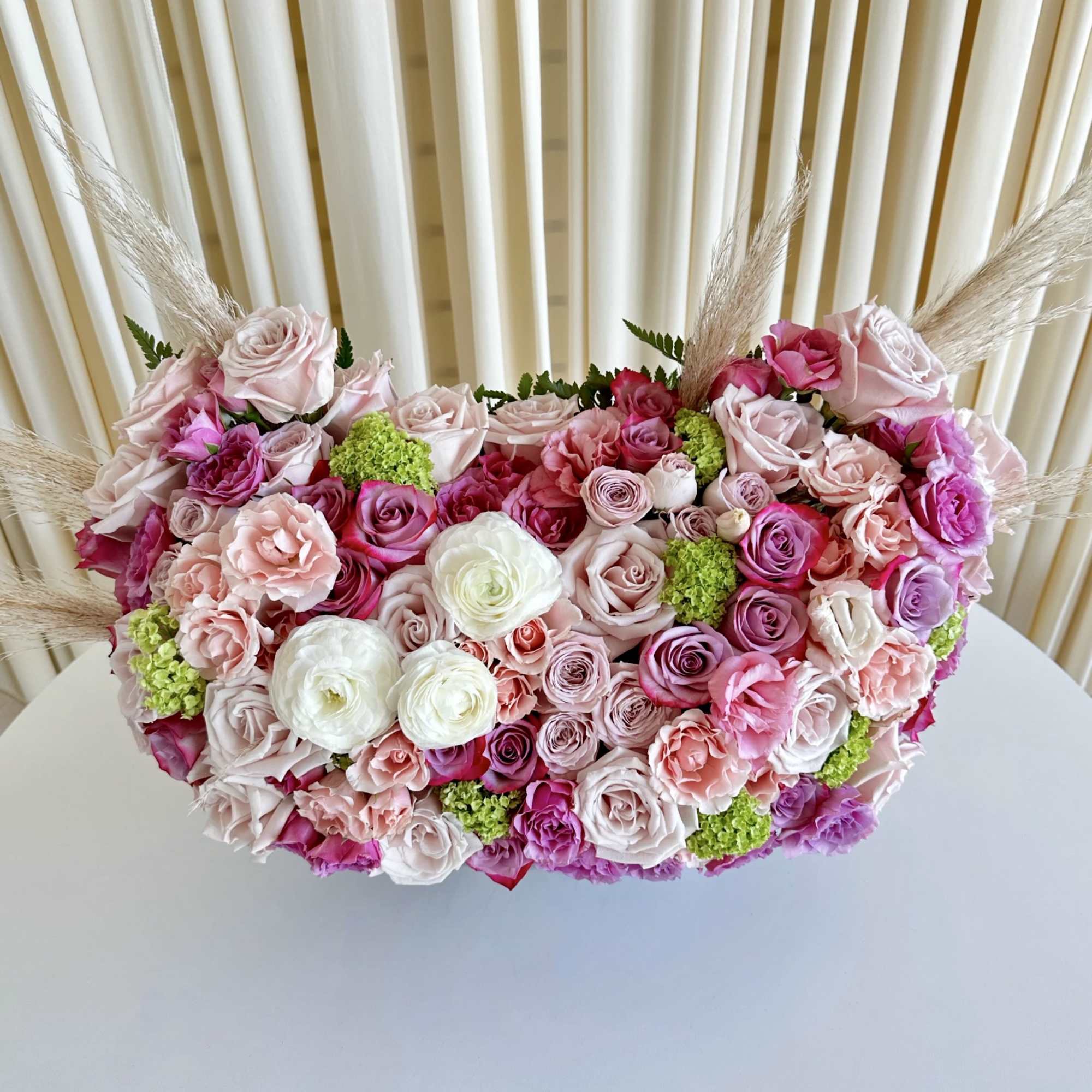 Immerse yourself in a kaleidoscope of hues with our &quot;Vibrant Blooms&quot; arrangement.