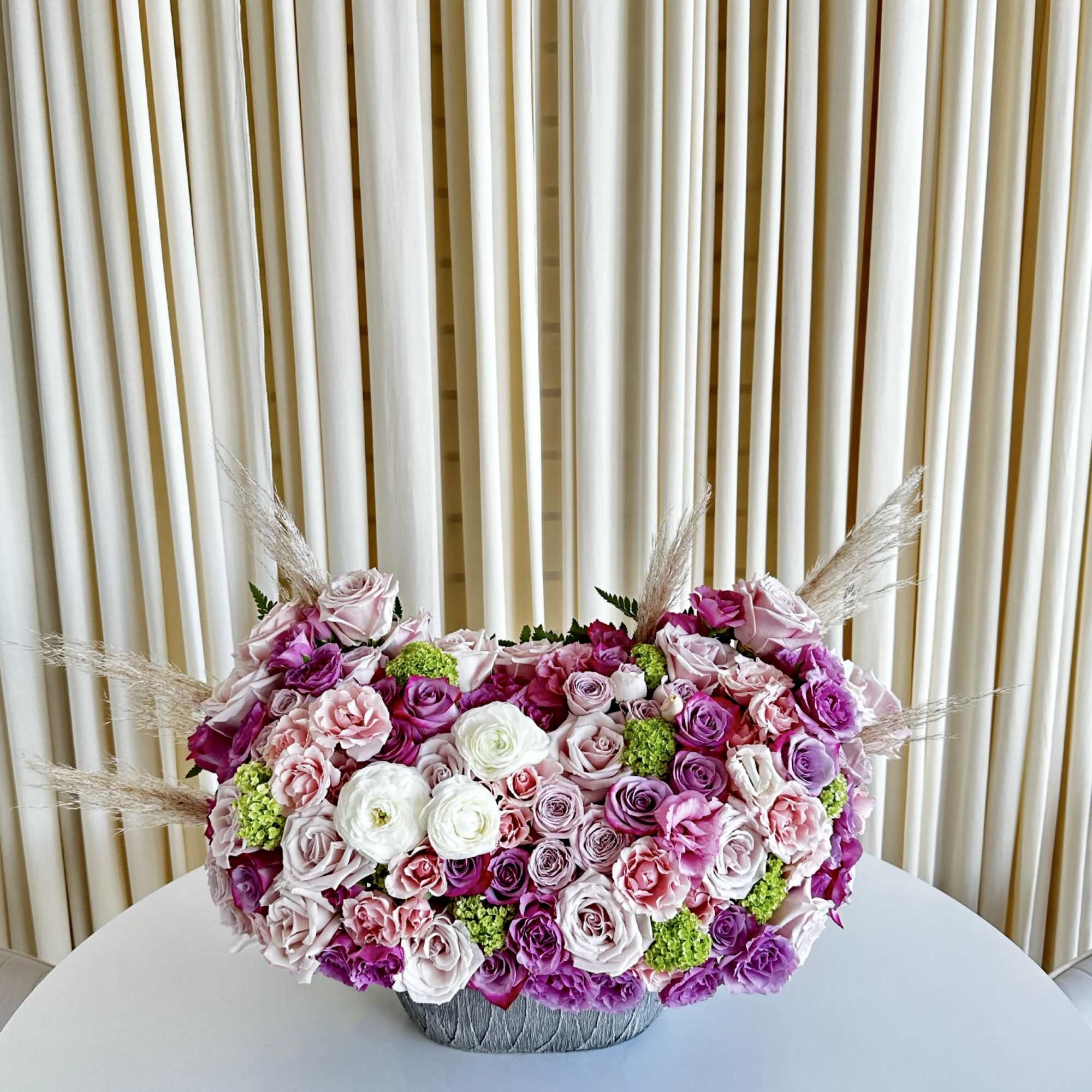 Immerse yourself in a kaleidoscope of hues with our &quot;Vibrant Blooms&quot; arrangement.