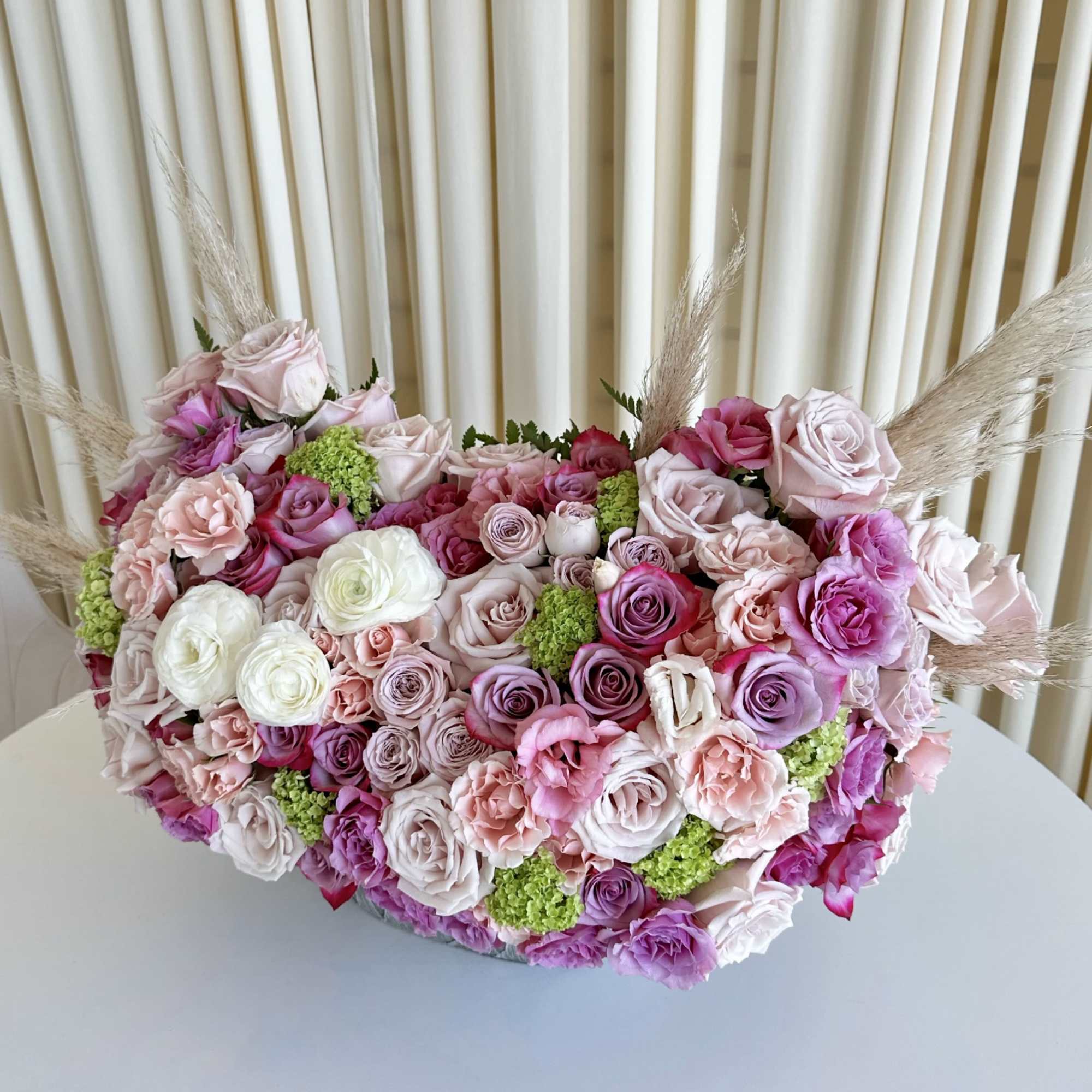 Immerse yourself in a kaleidoscope of hues with our &quot;Vibrant Blooms&quot; arrangement.