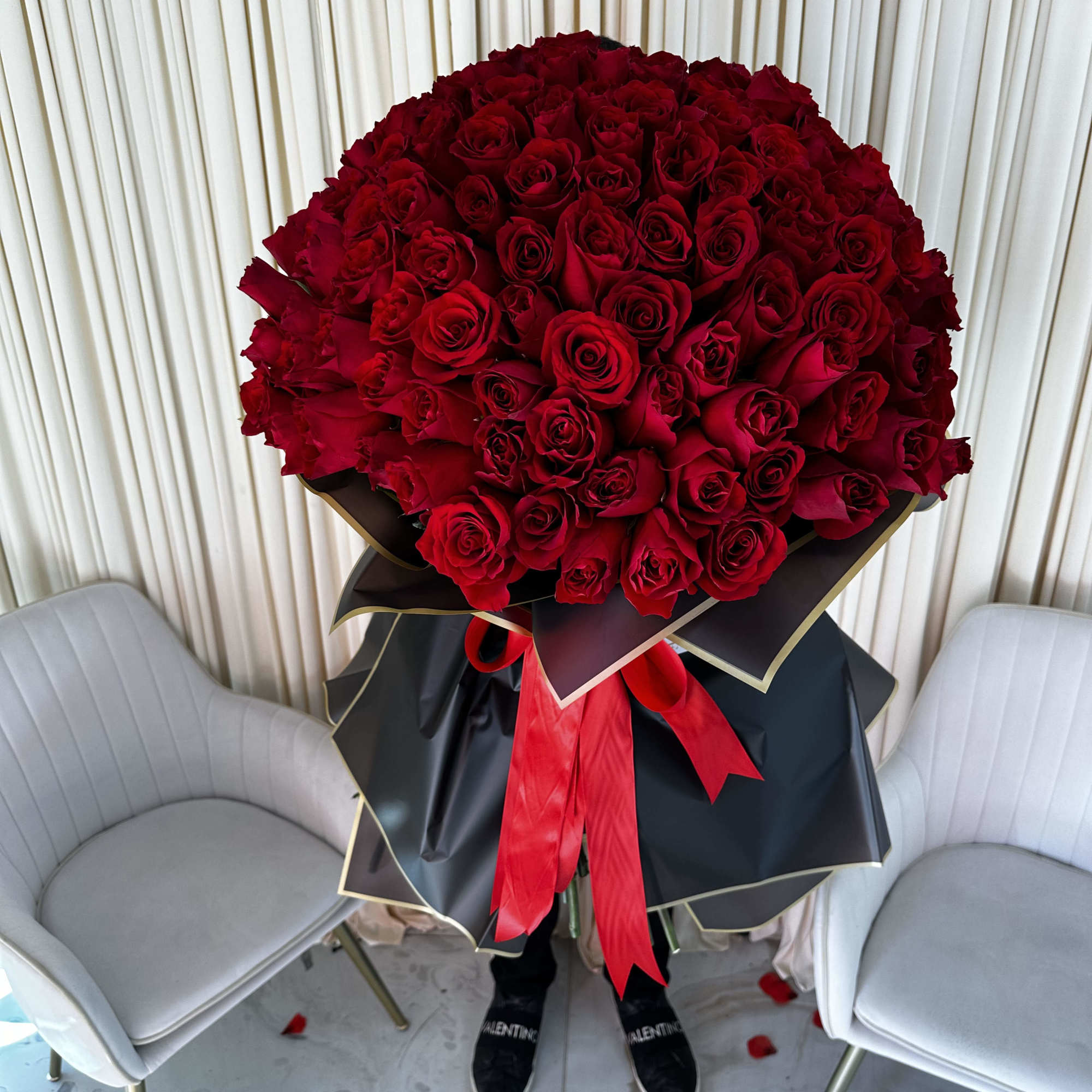 This decadent bouquet of 150 red roses is a powerful symbol of