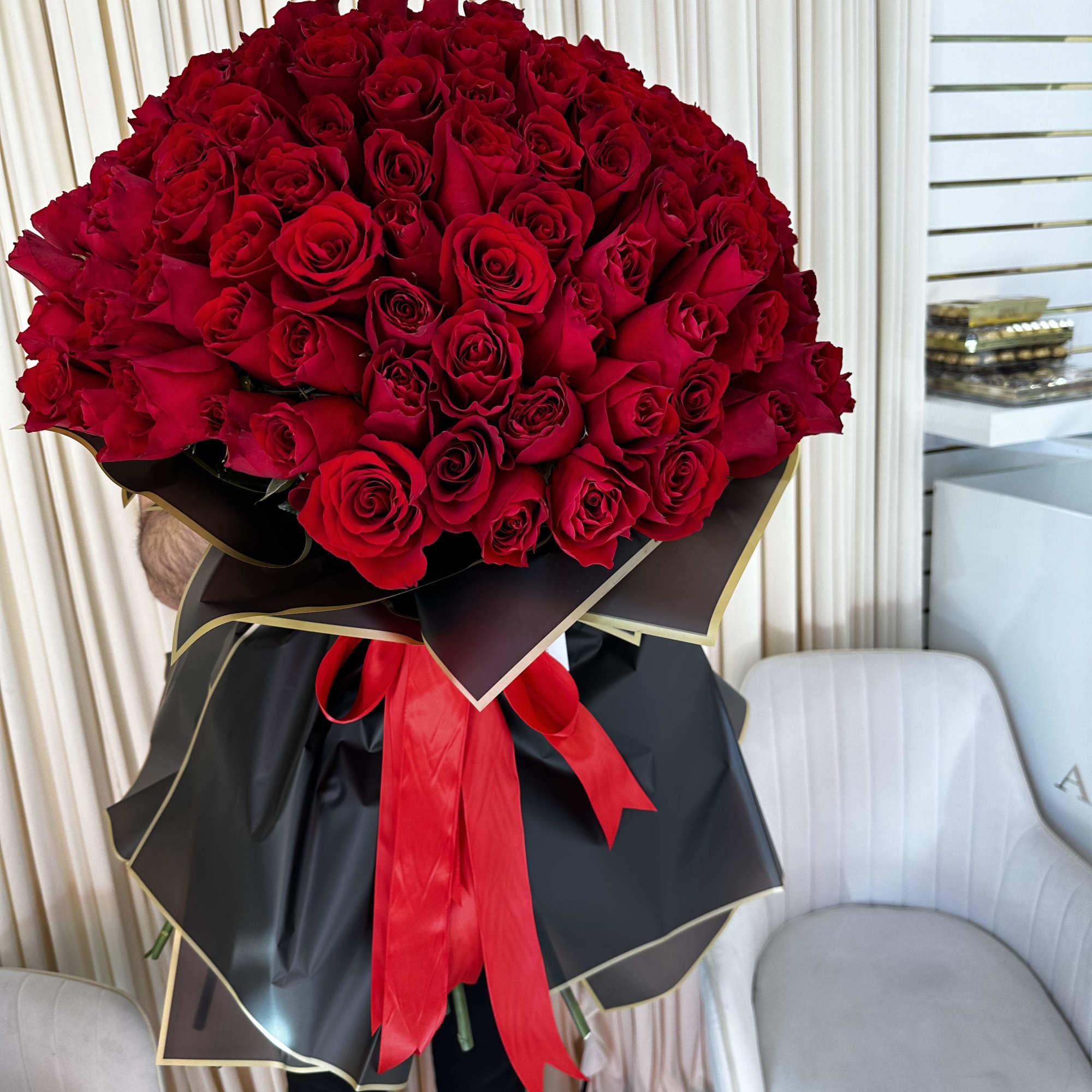 This decadent bouquet of 150 red roses is a powerful symbol of