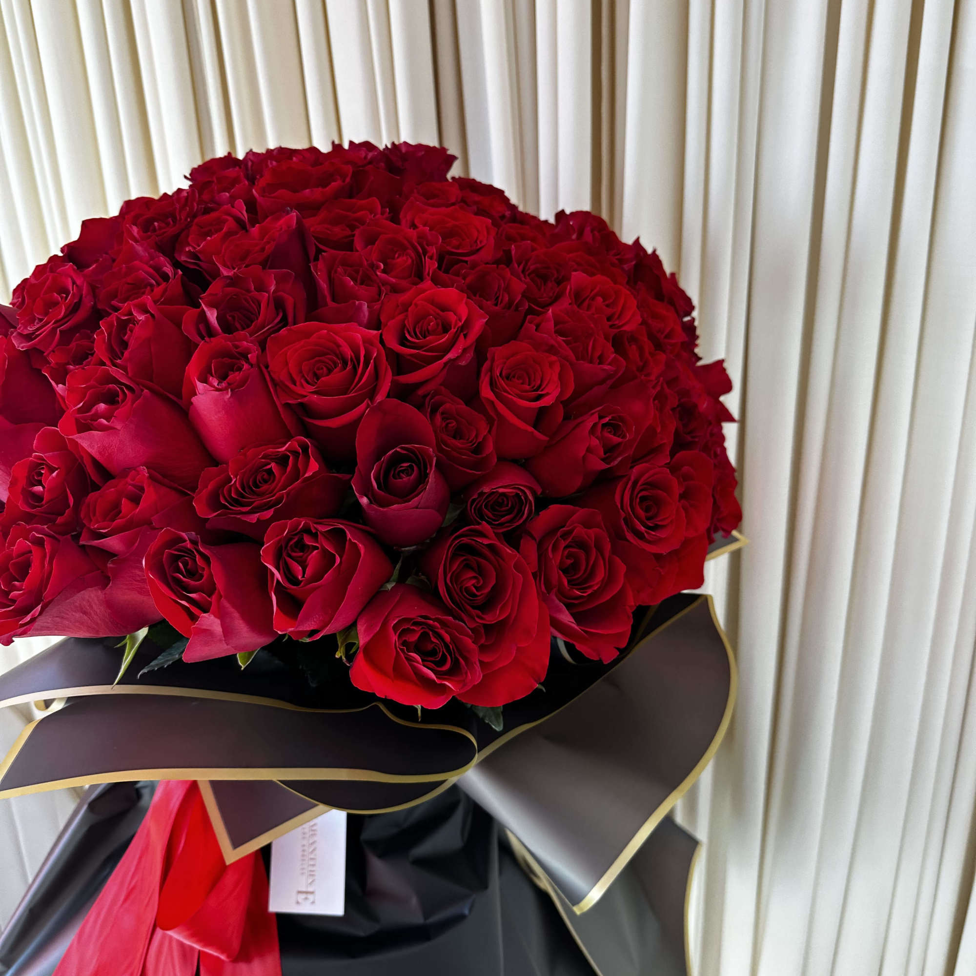 This decadent bouquet of 150 red roses is a powerful symbol of