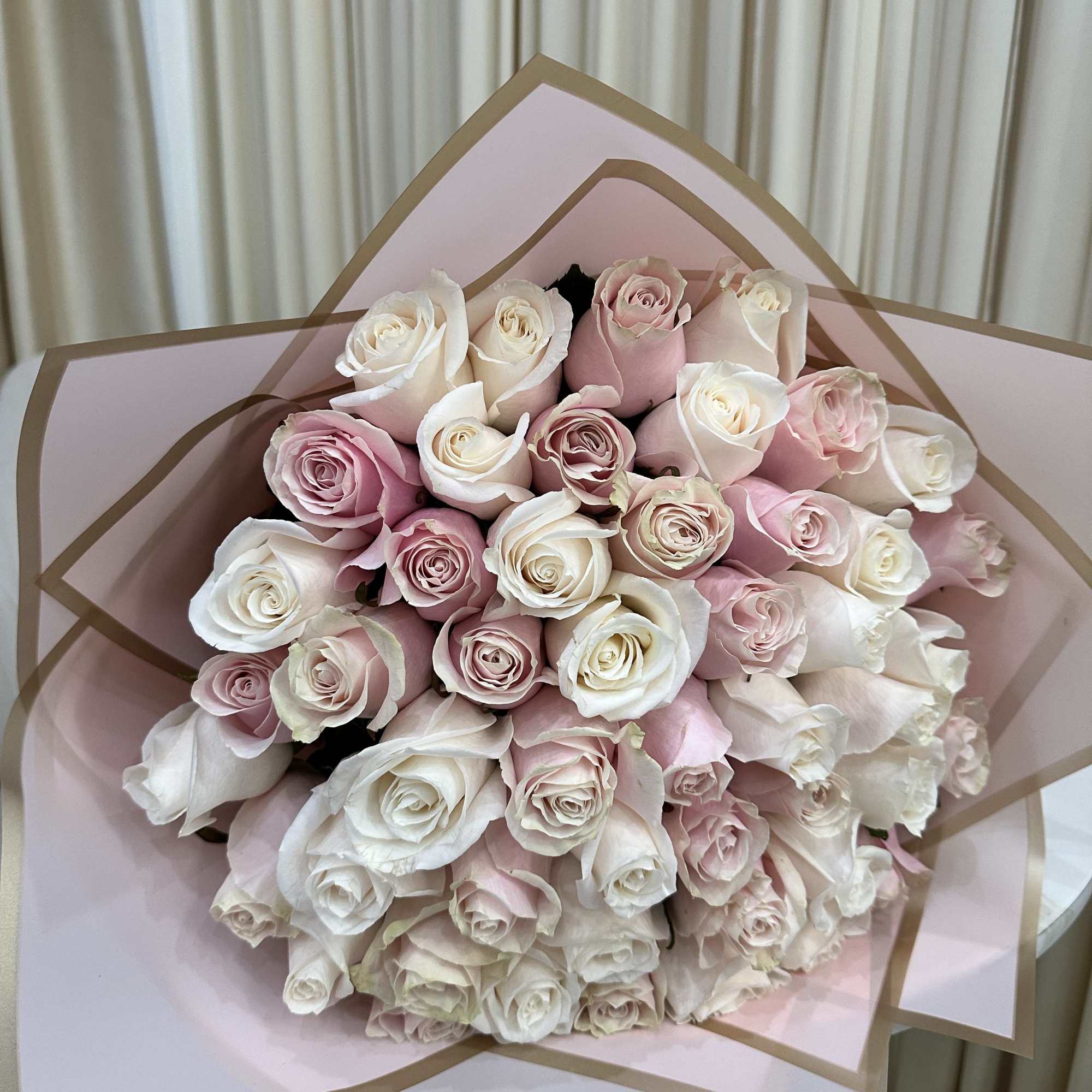 Express your love in full bloom with this delightful bouquet. Featuring 25