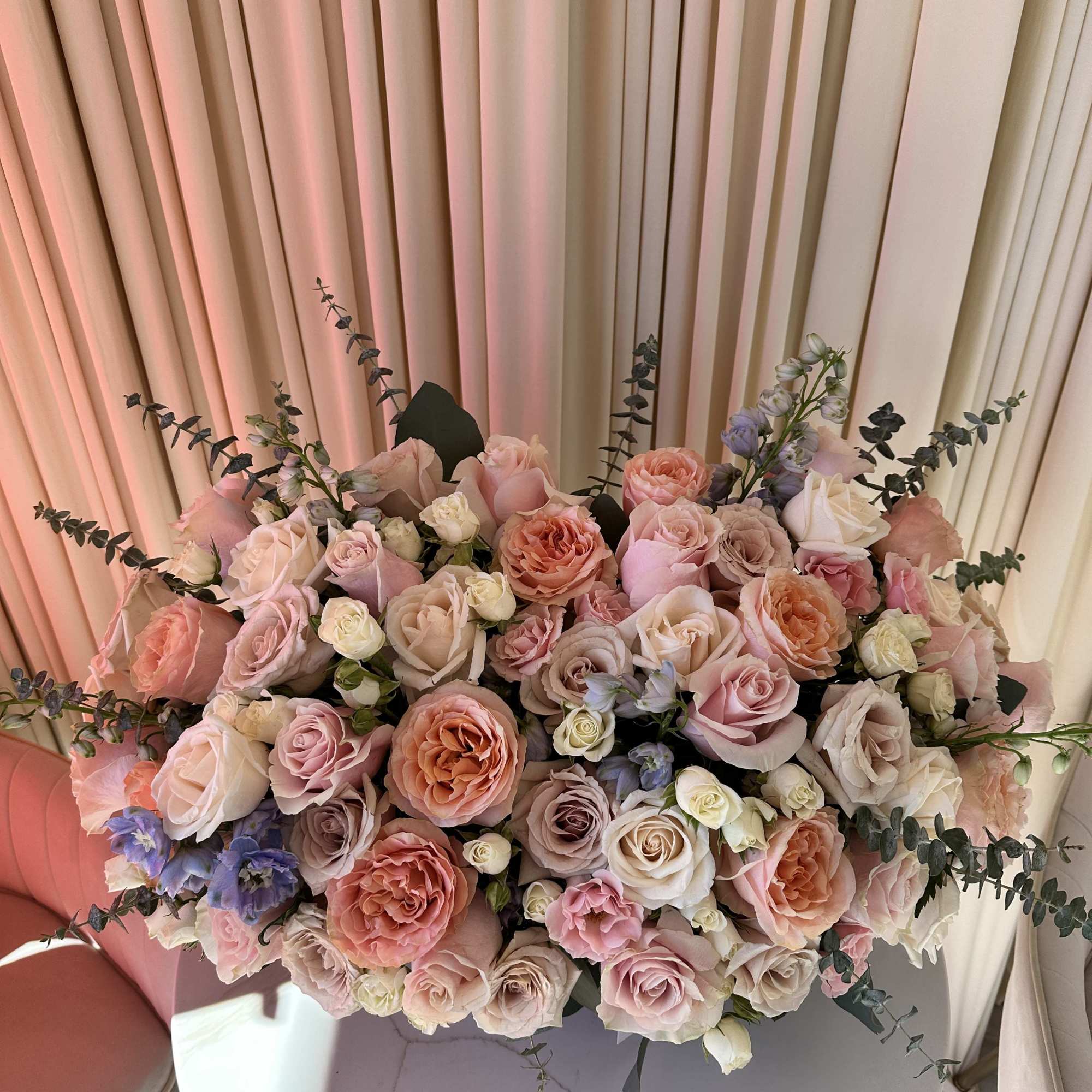 Capture the joy of a summer day with this vibrant bouquet featuring