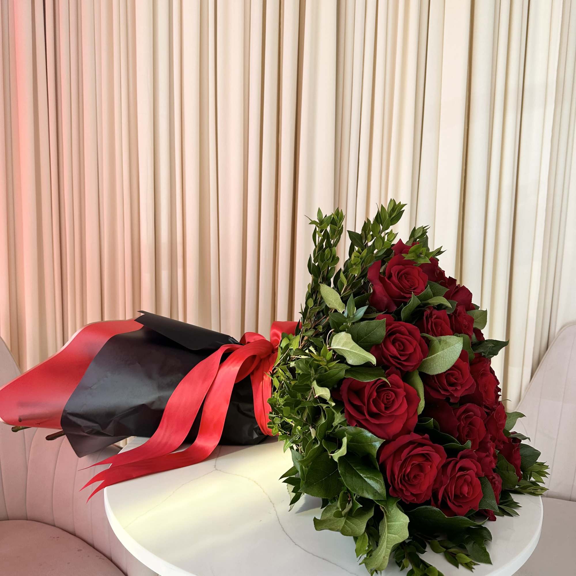 Celebrate a momentous occasion with this breathtaking bouquet of 25 fiery red
