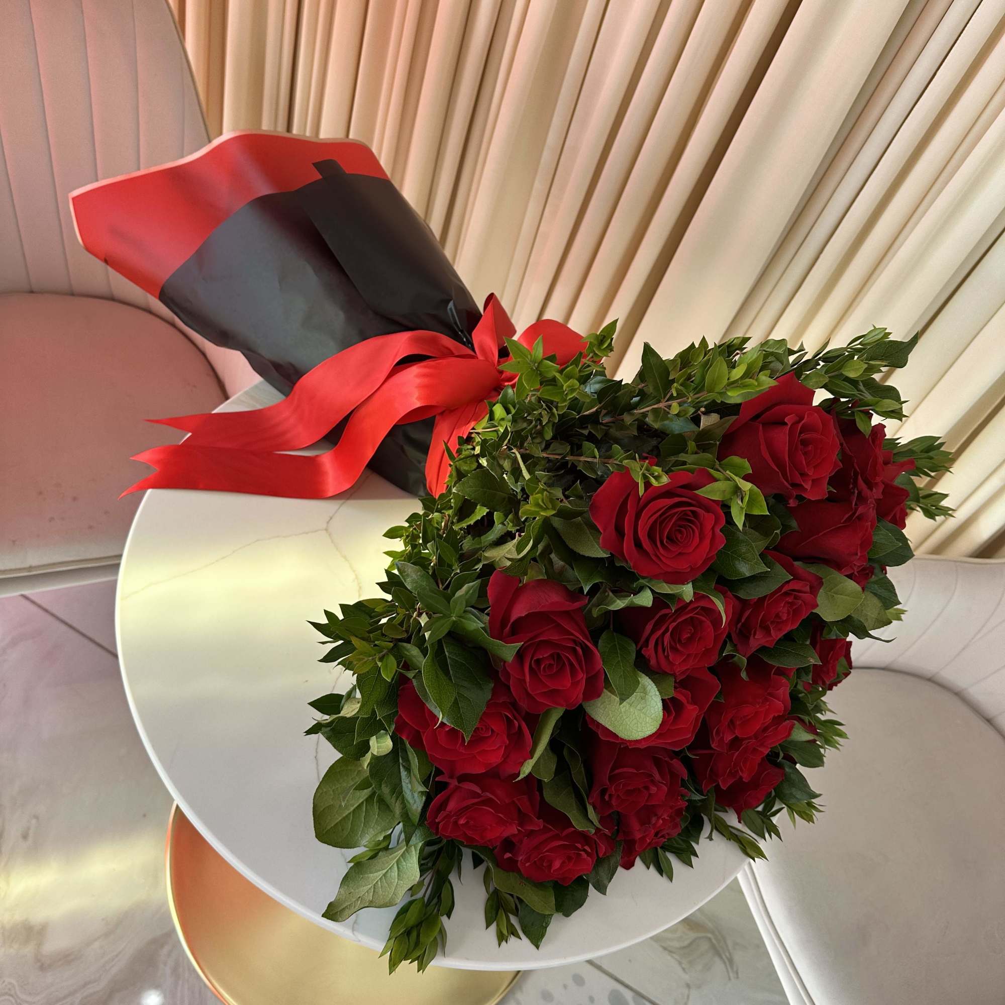 Celebrate a momentous occasion with this breathtaking bouquet of 25 fiery red