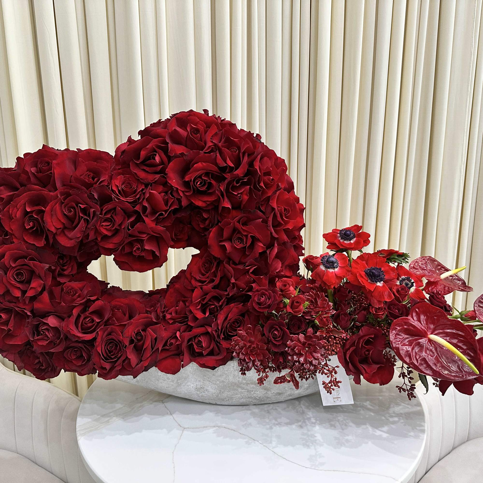 Capture Hearts with this Enchanting Red Rose Masterpiece

Let love bloom with this