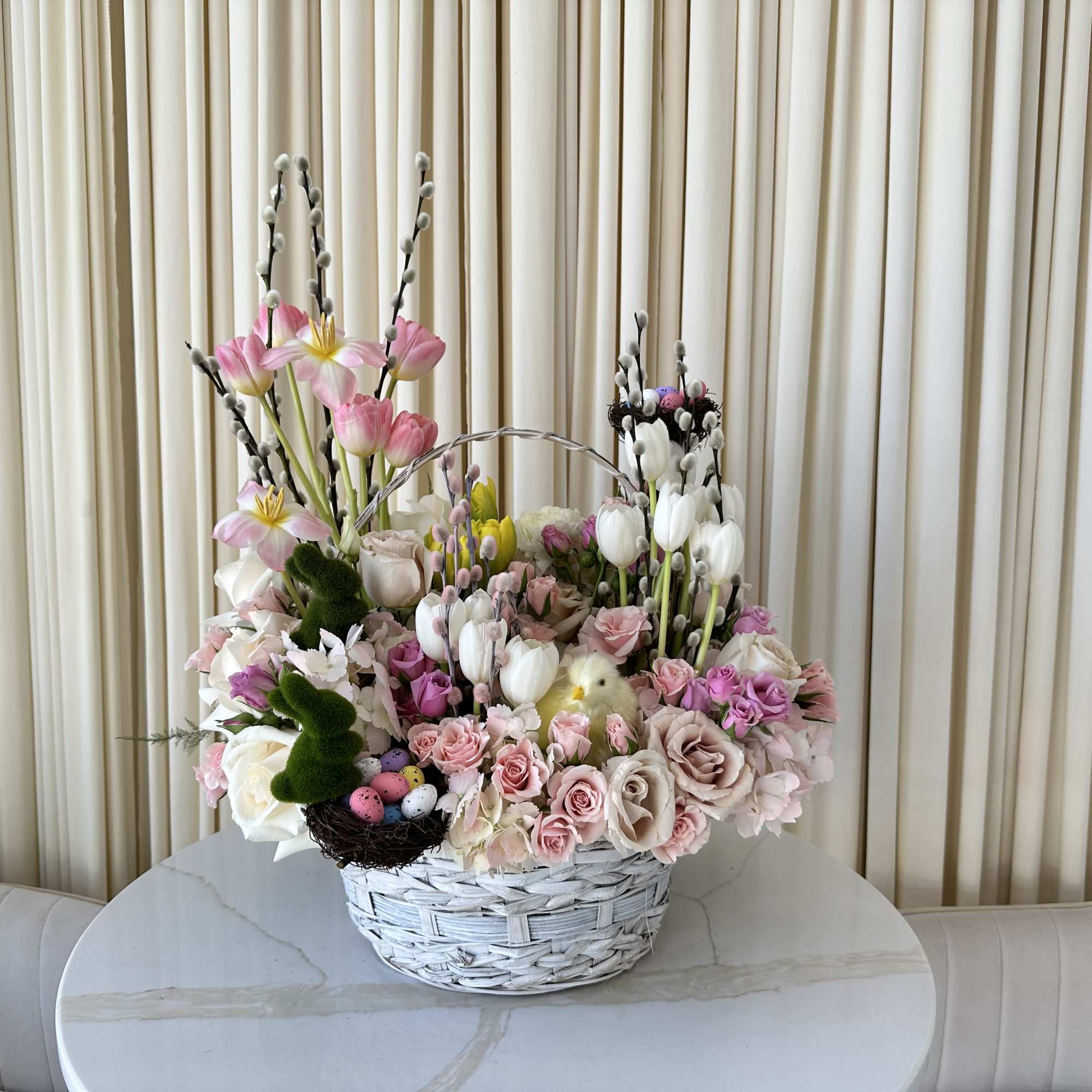 Ring in the Easter season with this delightful basket filled with springtime