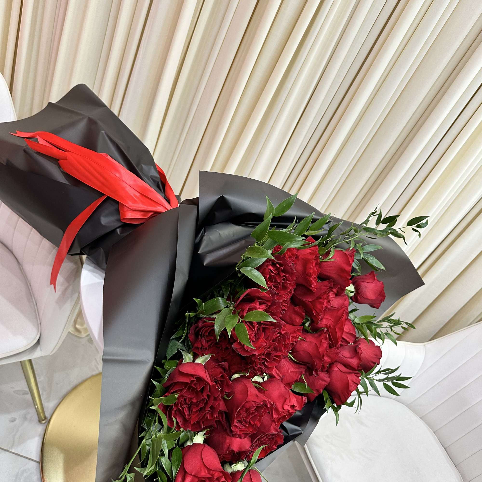 Symbolize your undying love and passion with this breathtaking bouquet of red