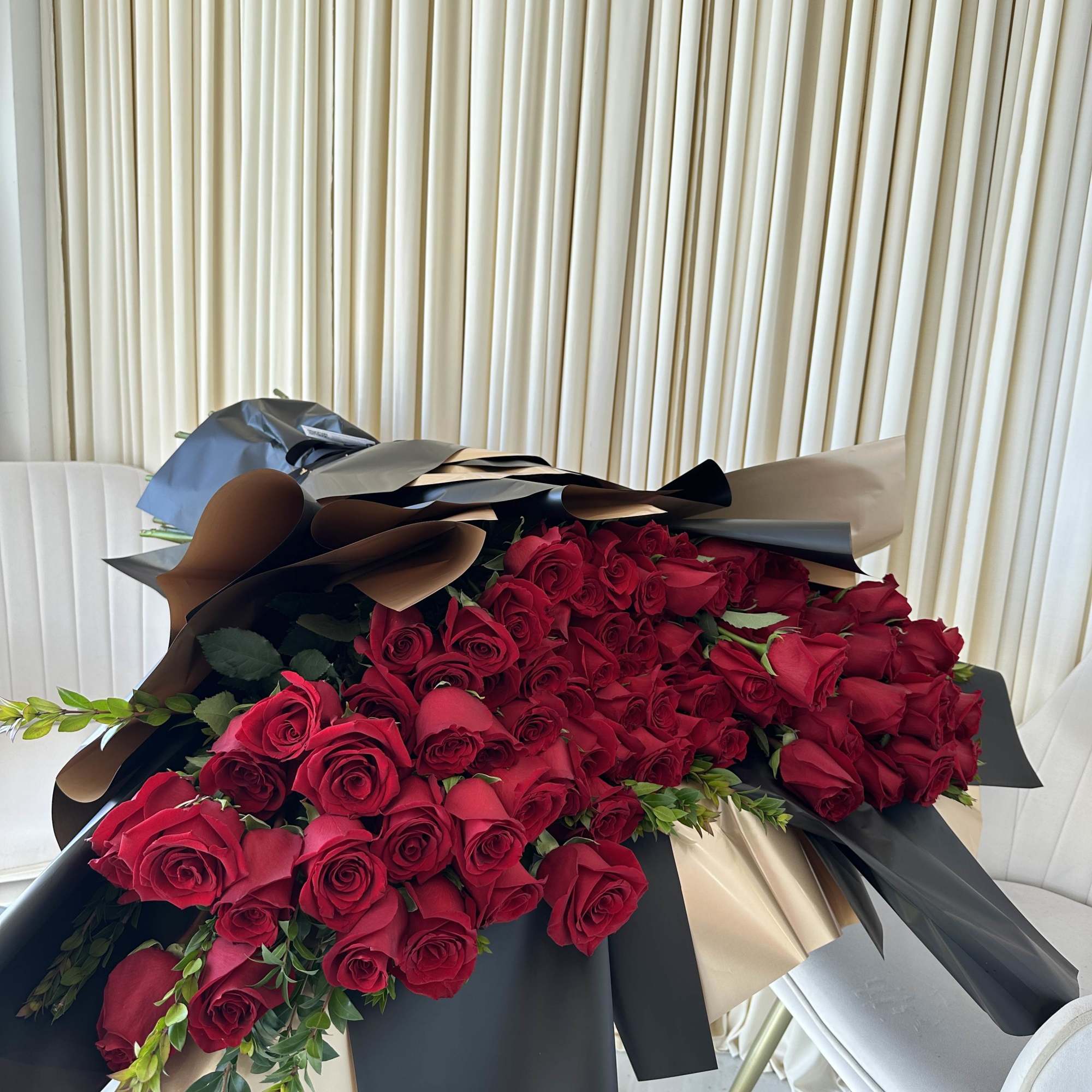 Symbolize your undying love and passion with this breathtaking bouquet of red