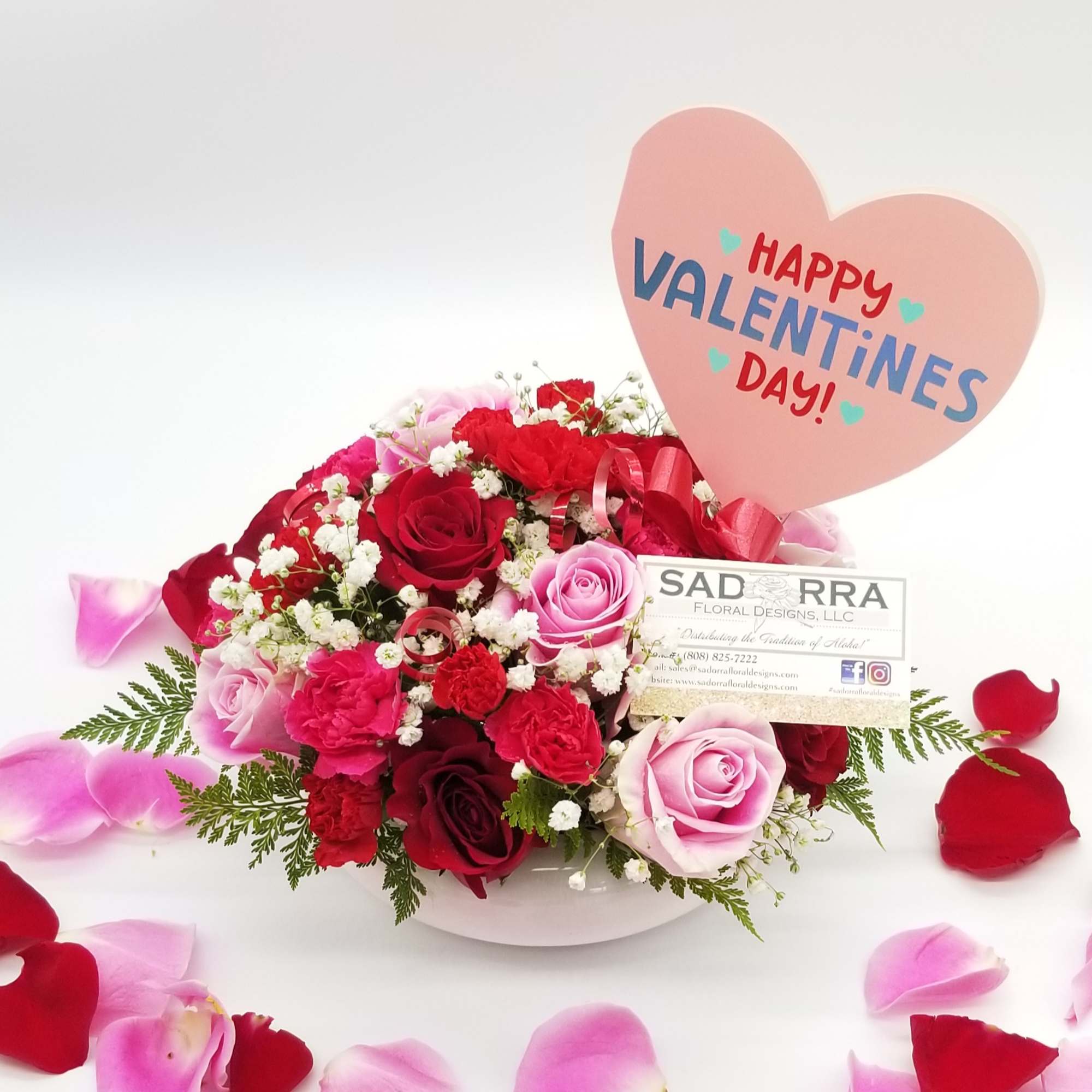 A Dozen Rose arrangement with Red &amp; Pink Roses with mini carnations...made