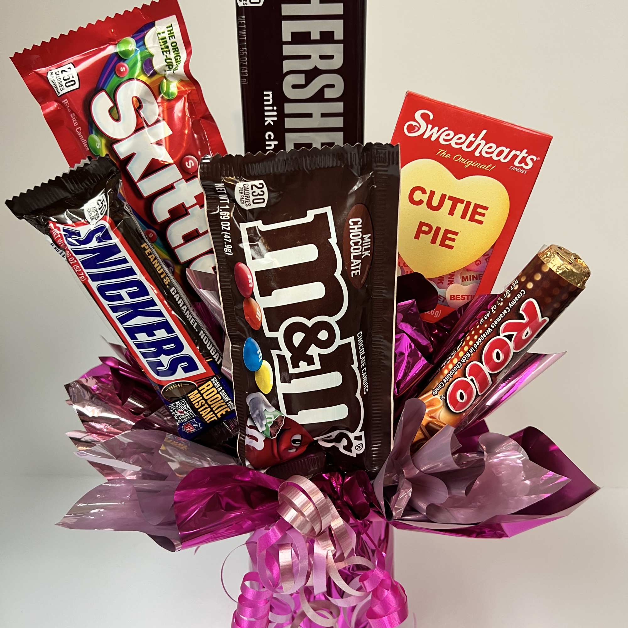 Unique Candy Bar Bouquet that pairs great with your flower-giving!  Five