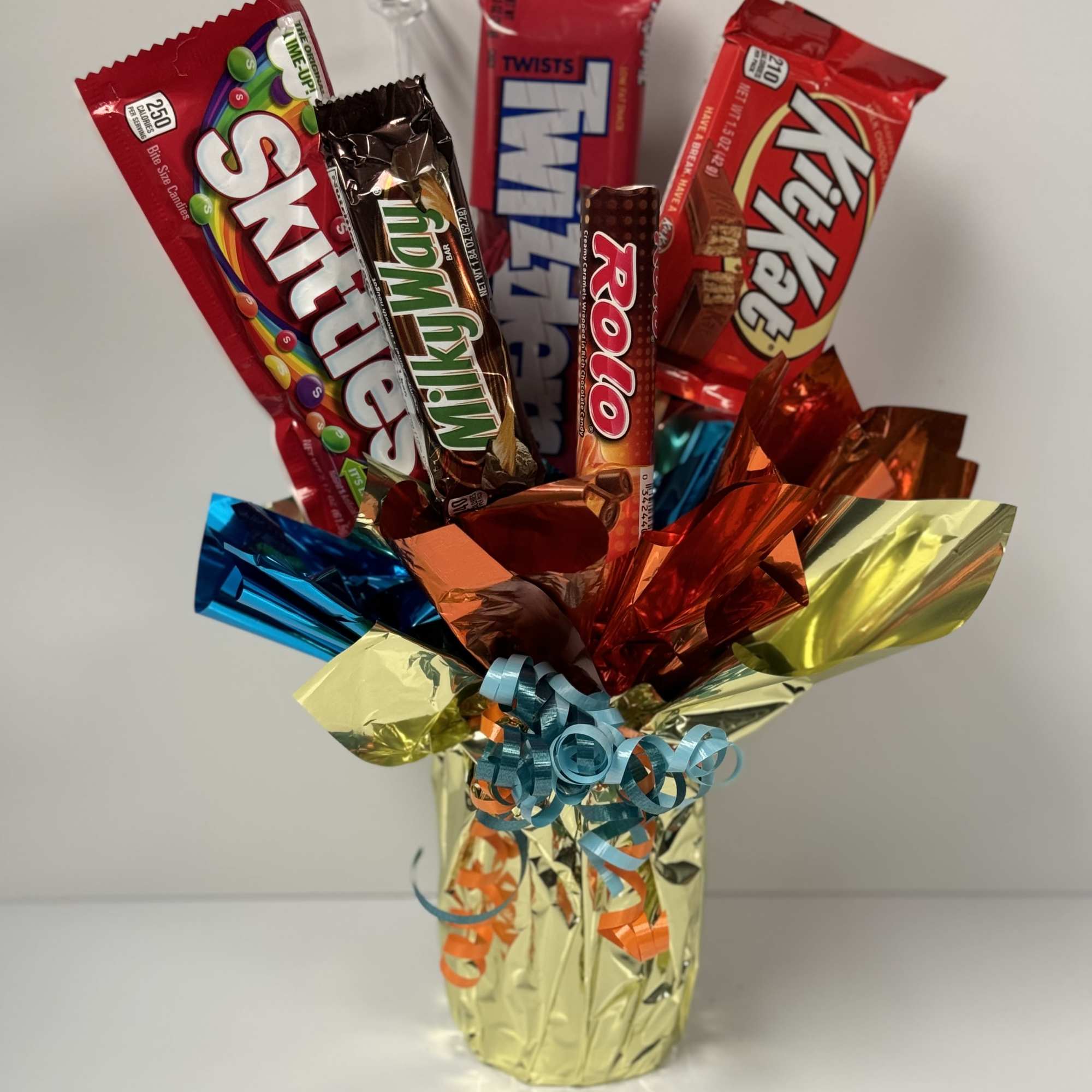 Unique Candy Bar Bouquet that pairs great with your flower-giving!  Five