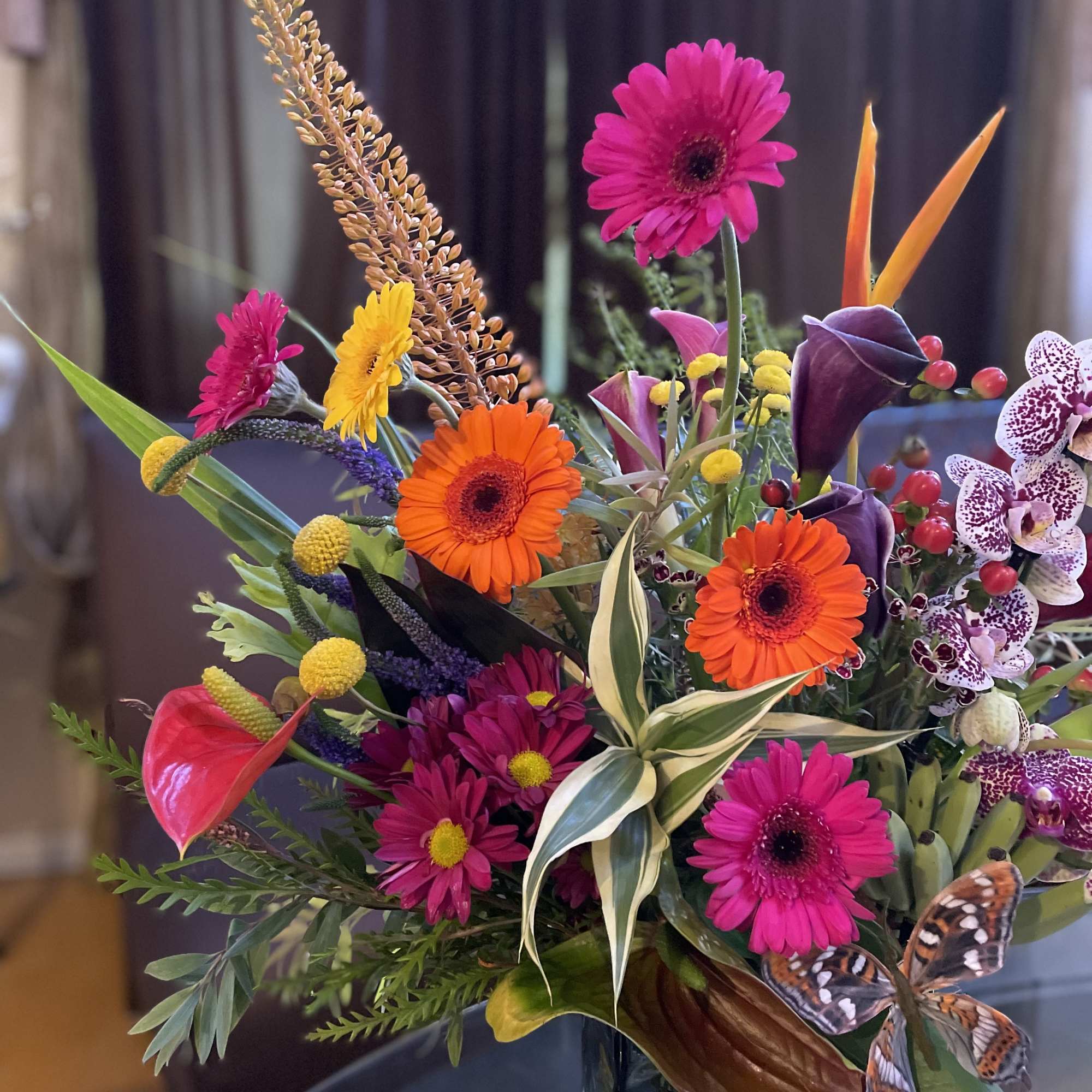 A vibrant and exotic fusion of tropical elements creates an awe-inspiring arrangement