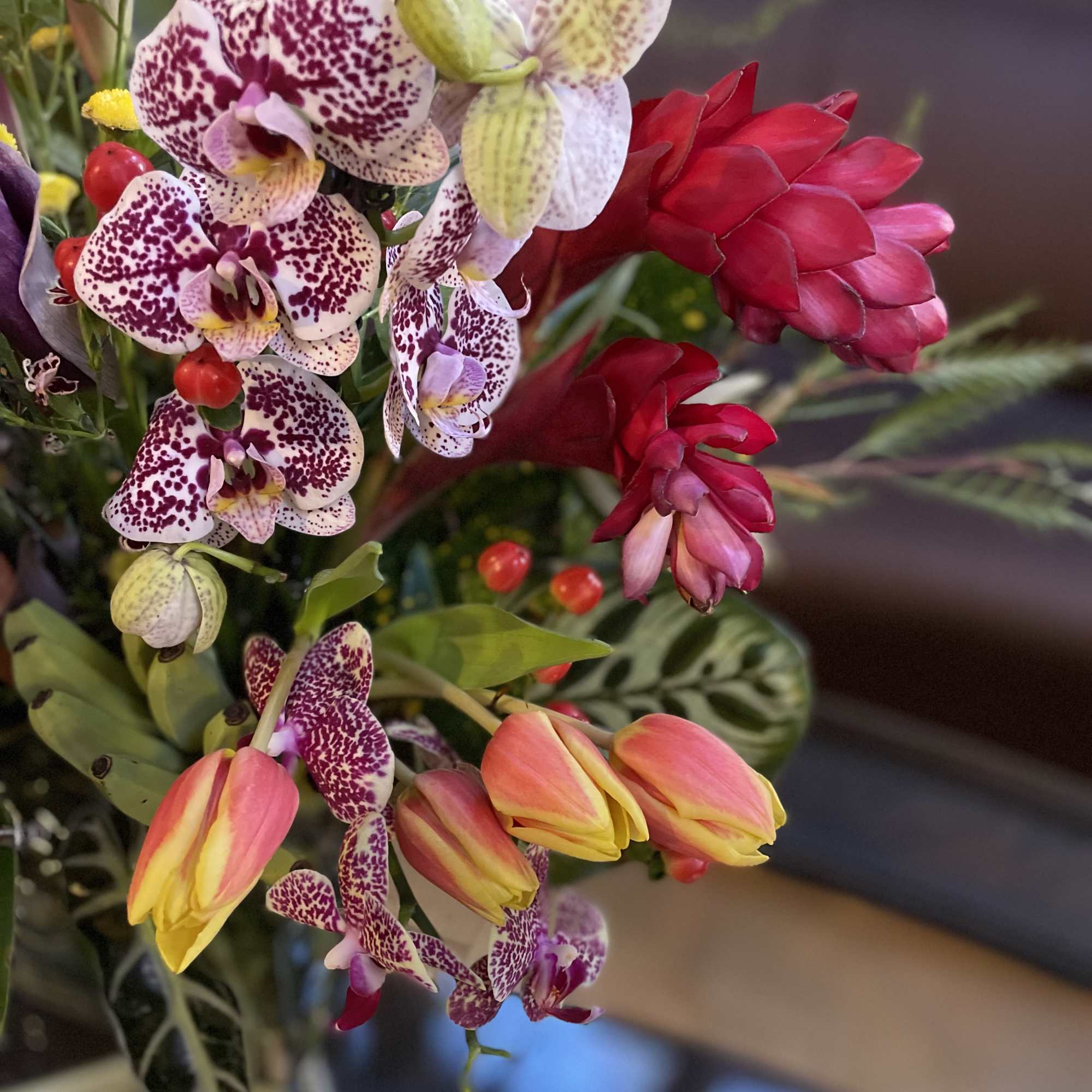 A vibrant and exotic fusion of tropical elements creates an awe-inspiring arrangement