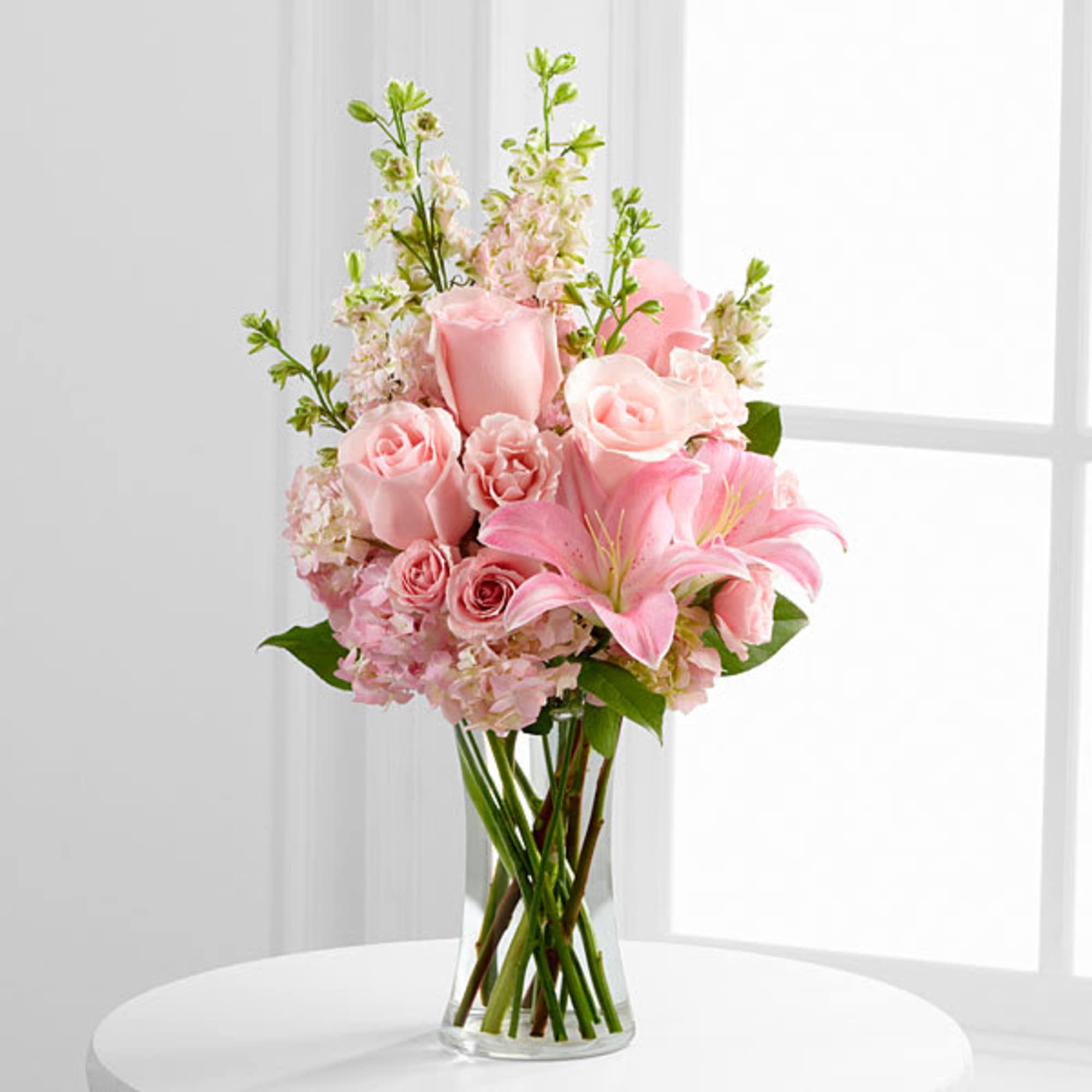 The Wishes & Blessings Bouquet is a stunning way to offer your The Wishes & Blessings Bouquet is a stunning way to offer your