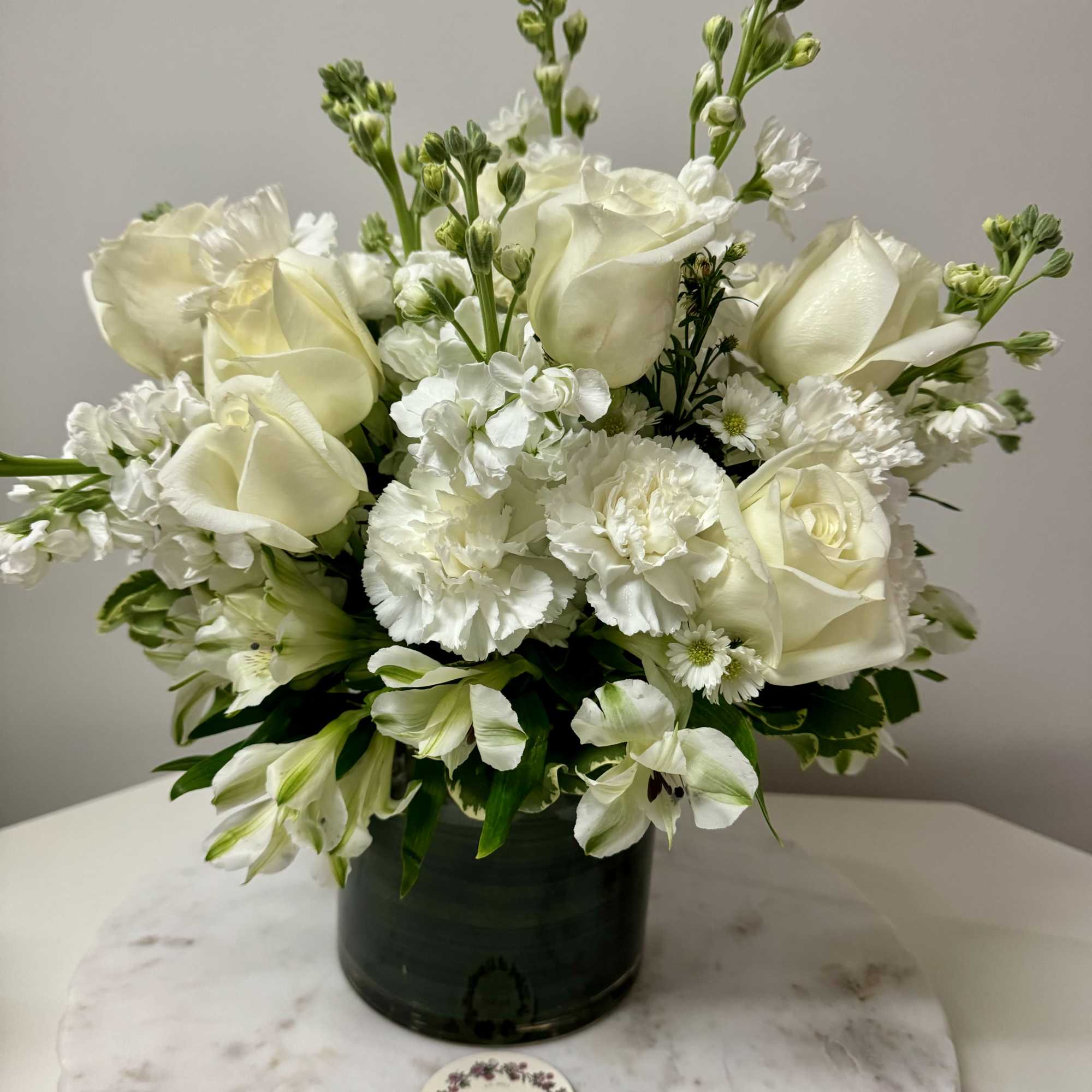 A bouquet of Serenity ,  white blooms designed to bring peace
