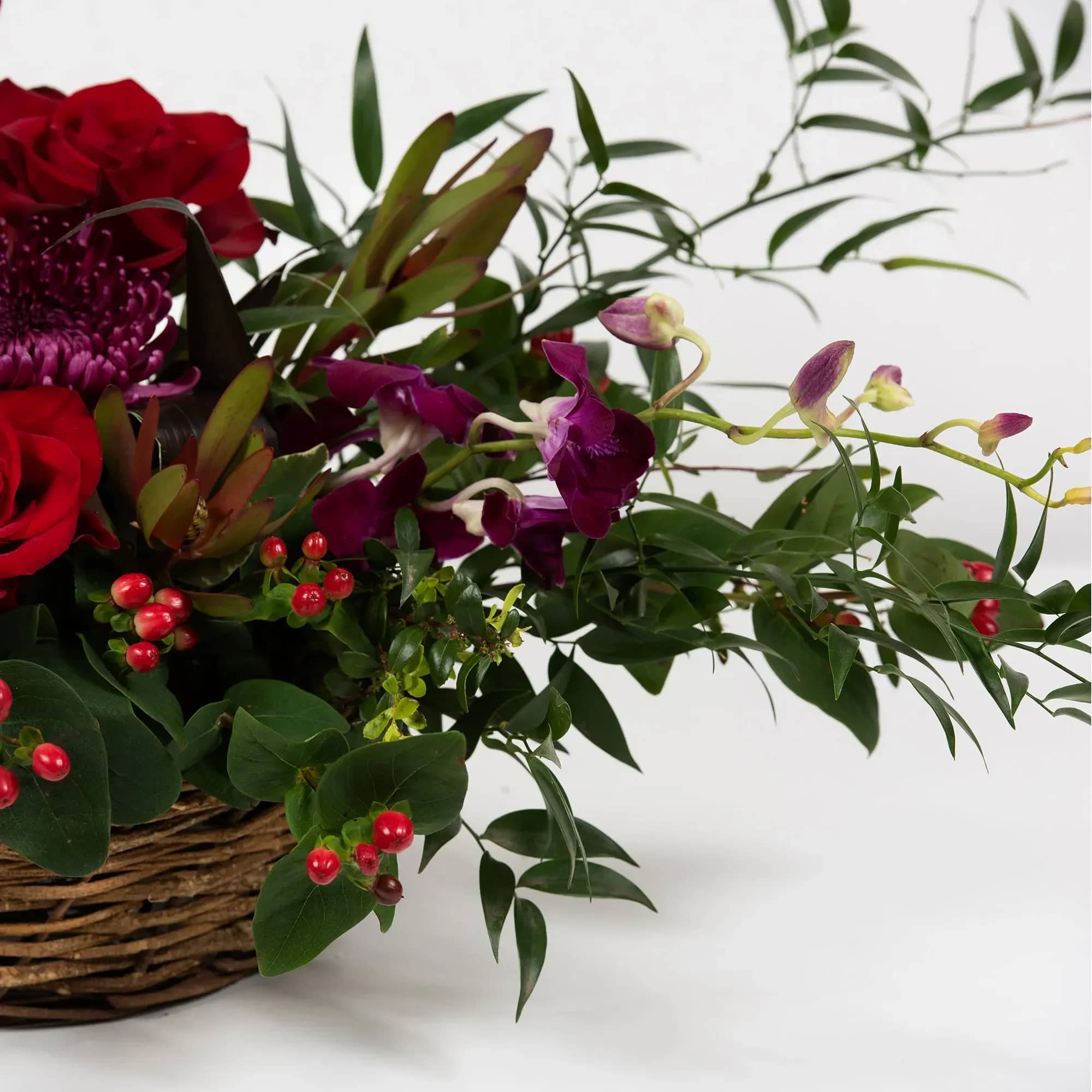 Basket of Orchids, alstroemerias and roses