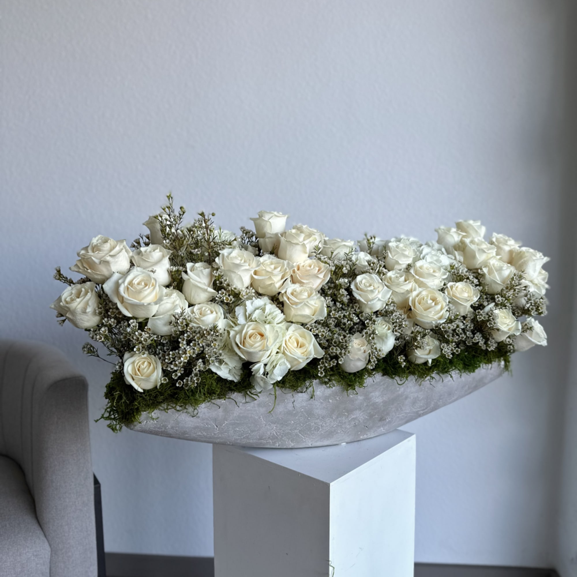 A chic rendezvous of nature and urban style, our Modern Concrete Blossom