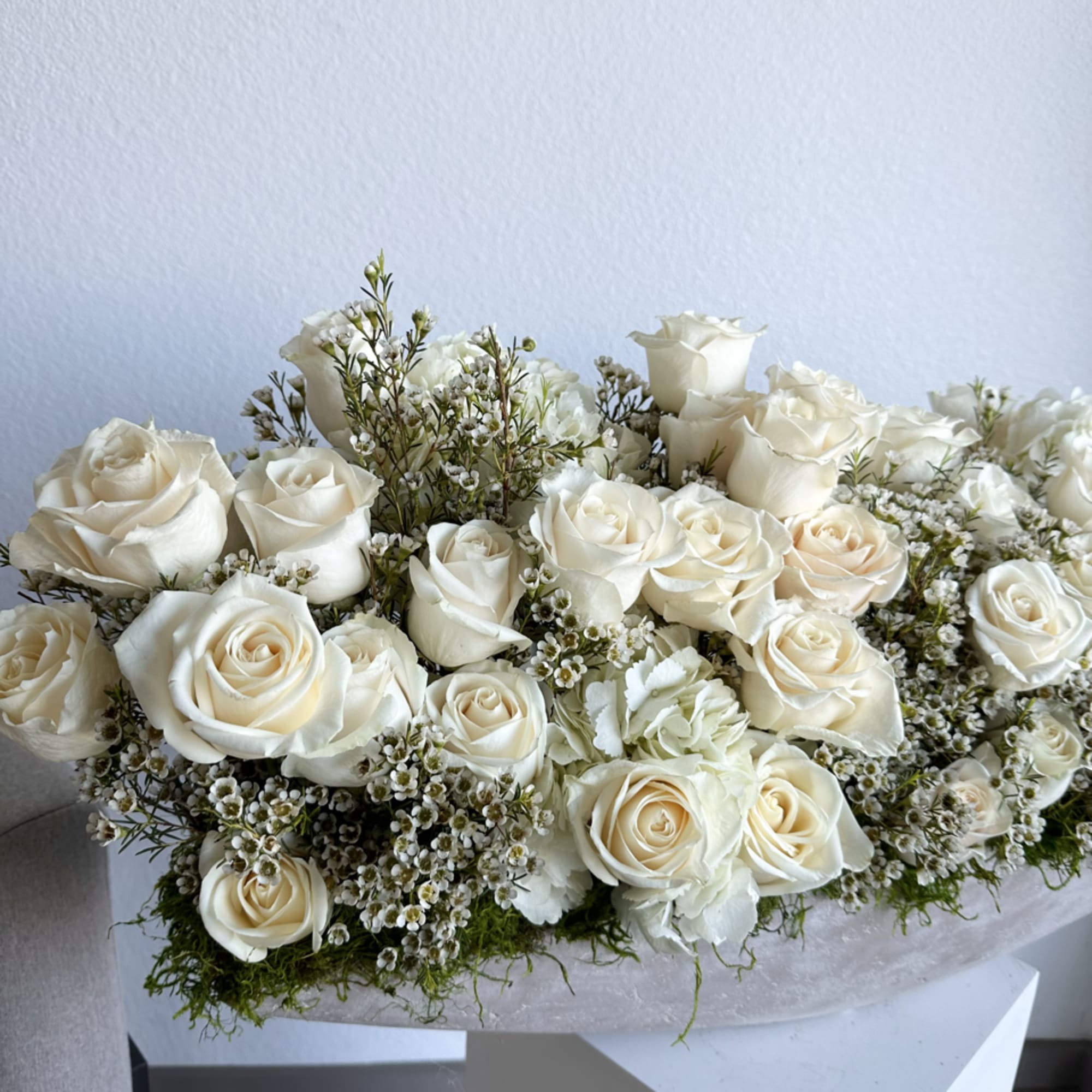 A chic rendezvous of nature and urban style, our Modern Concrete Blossom