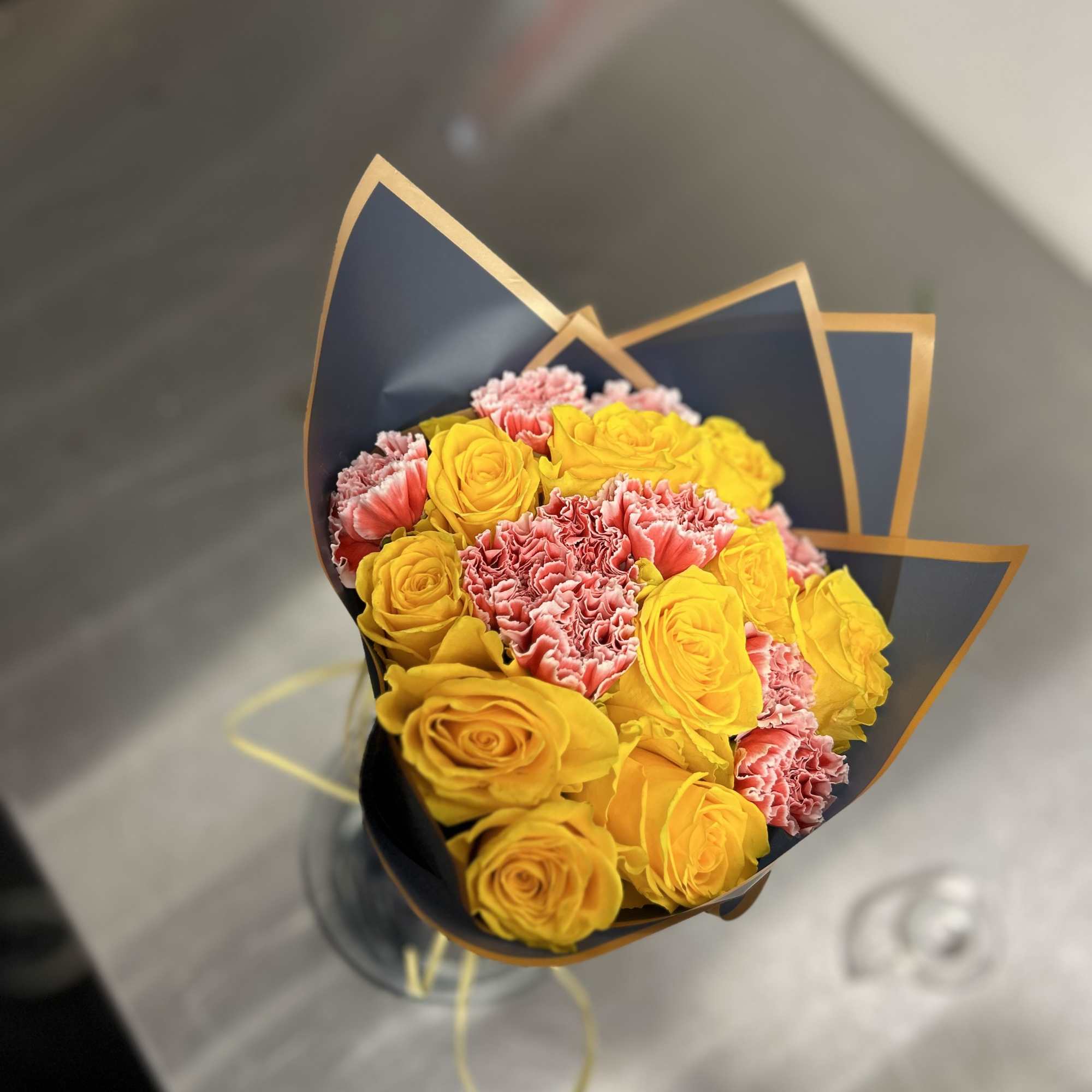 Beautiful custom arrangement of florals wrapped up for you to gift to