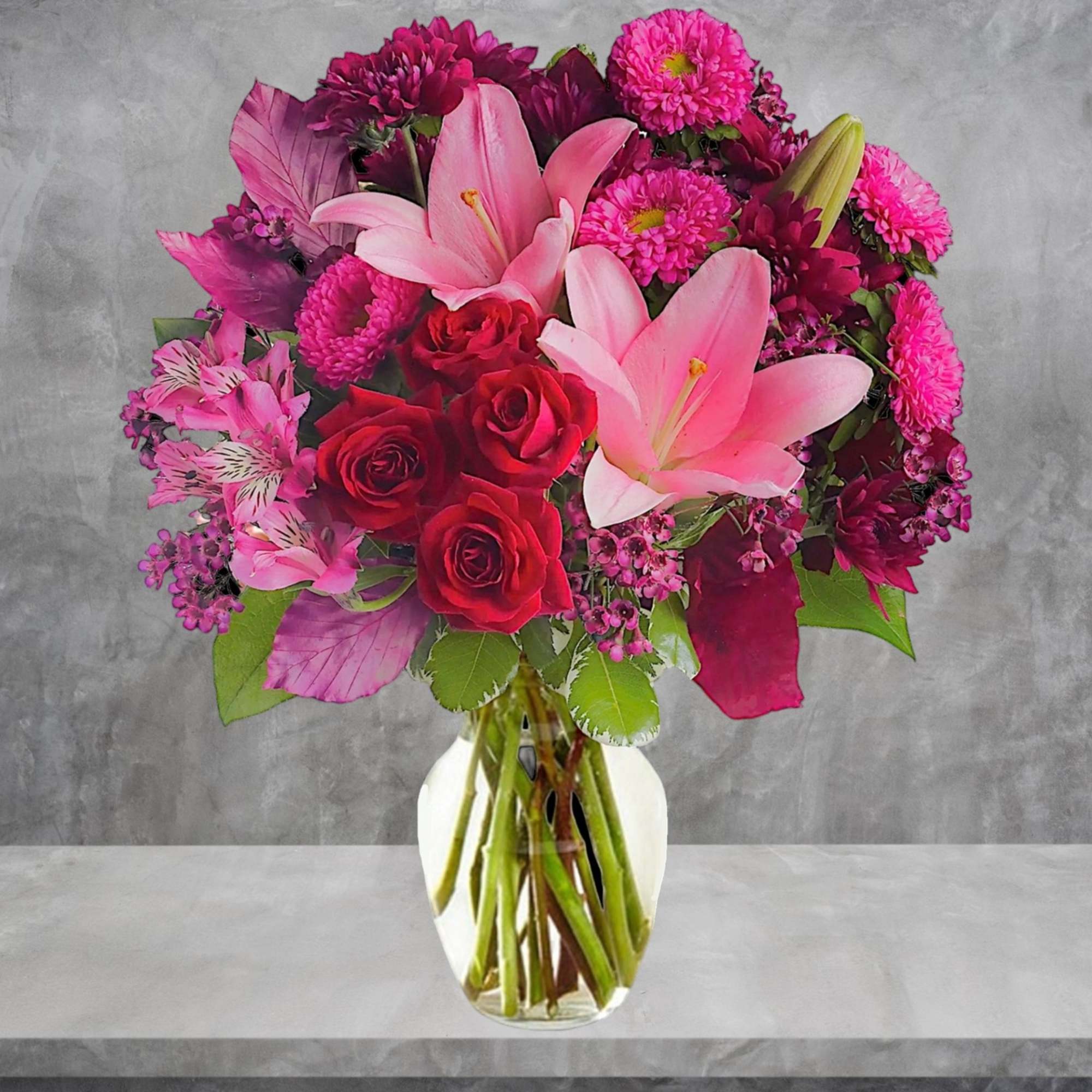 Soft, soothing shades of lavender contrast quietly with the hot pink and