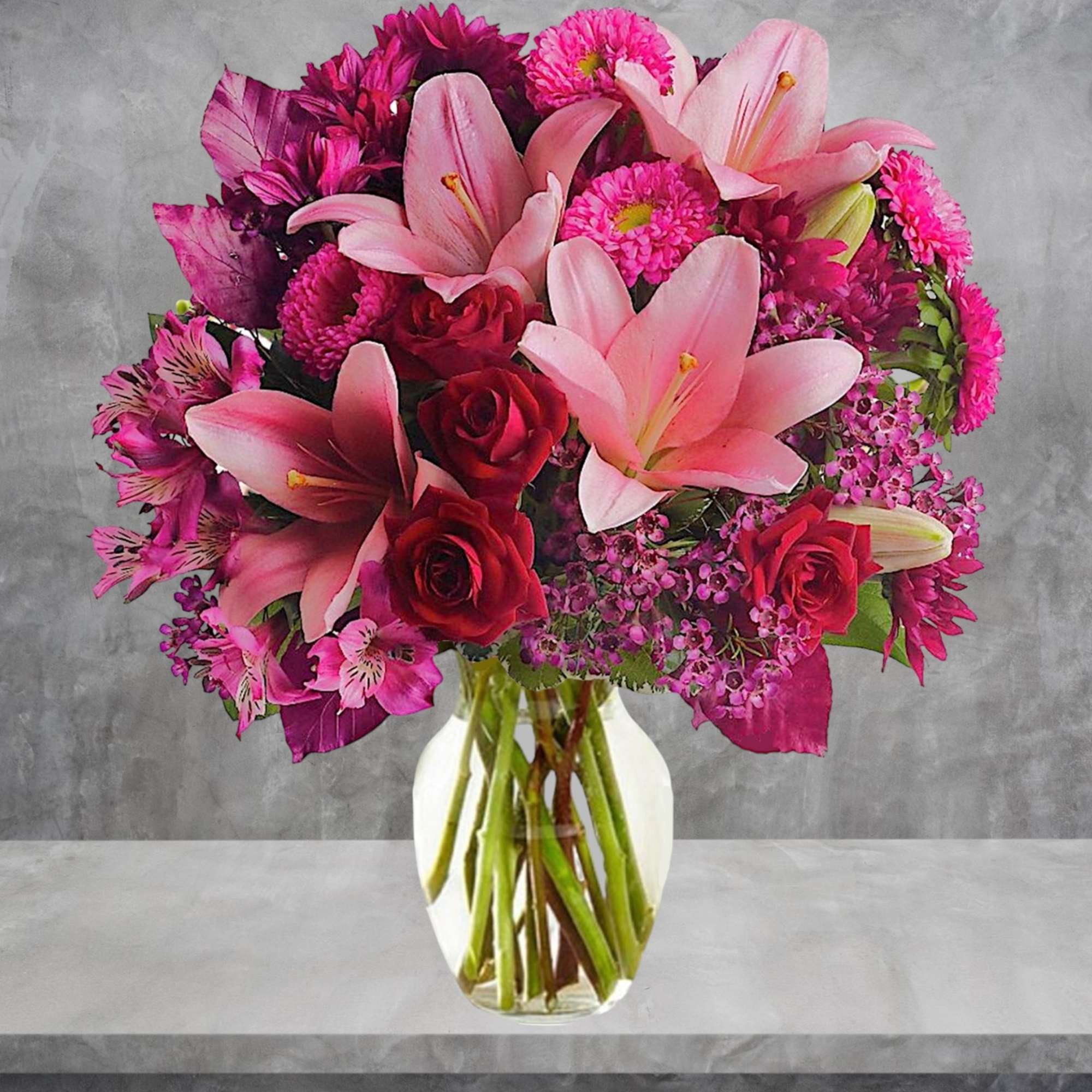 Soft, soothing shades of lavender contrast quietly with the hot pink and