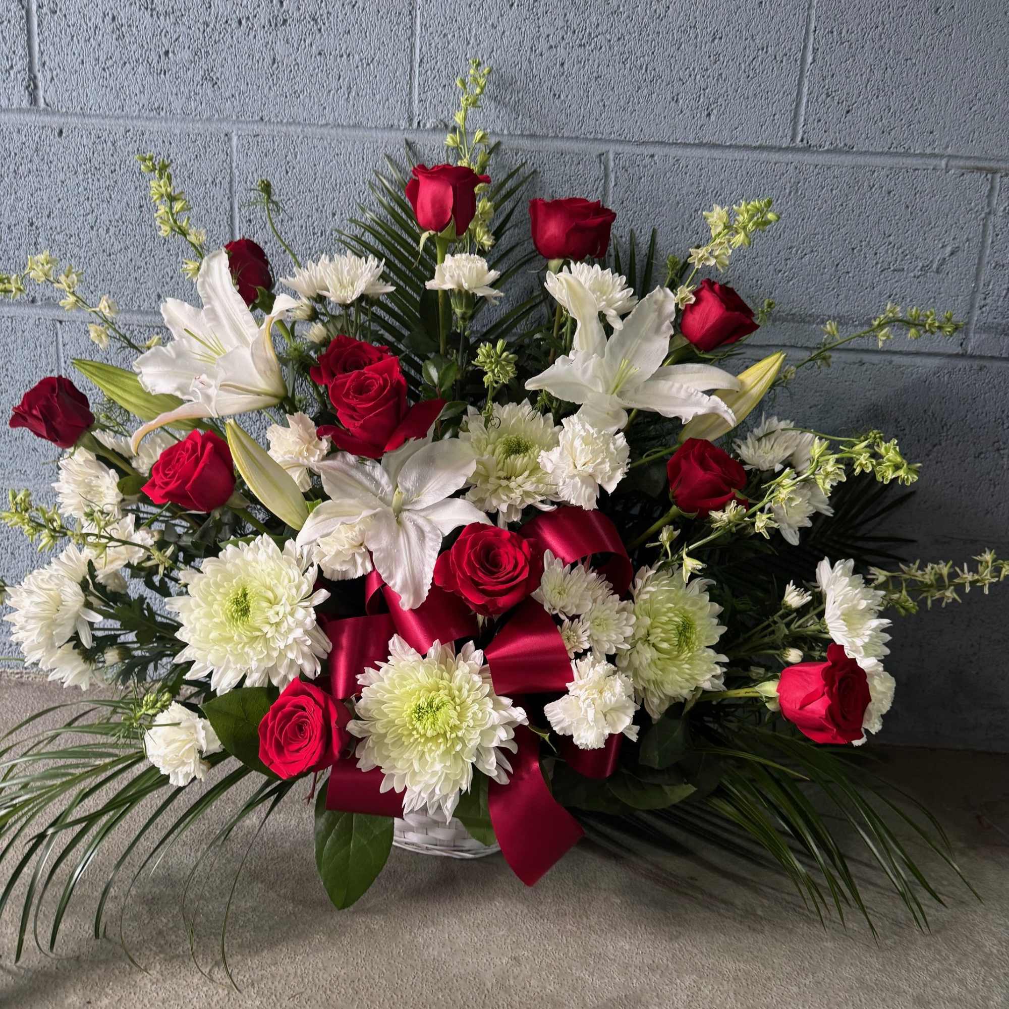Gorgeous 12 red Ecuadorian roses with 3 lilies, and other white flowers