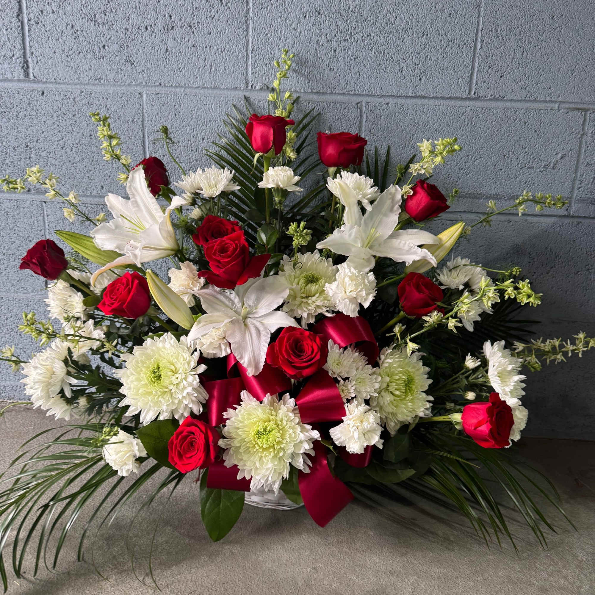 Gorgeous 12 red Ecuadorian roses with 3 lilies, and other white flowers