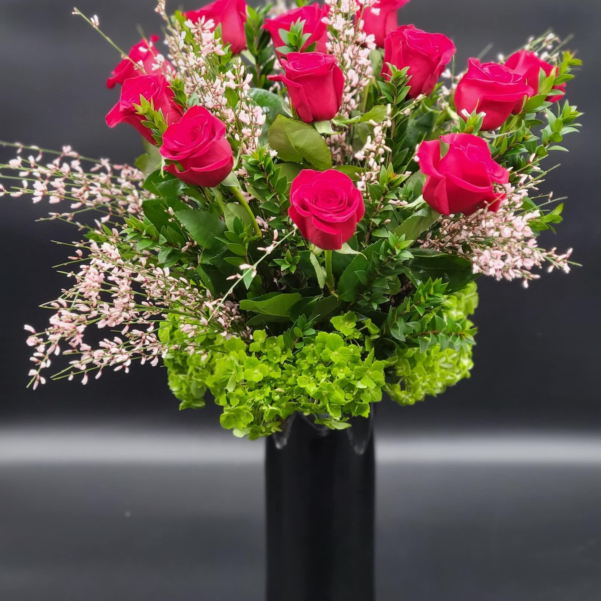Glass vase will display a burst of exquisite pink roses sure to Glass vase will display a burst of exquisite pink roses sure to