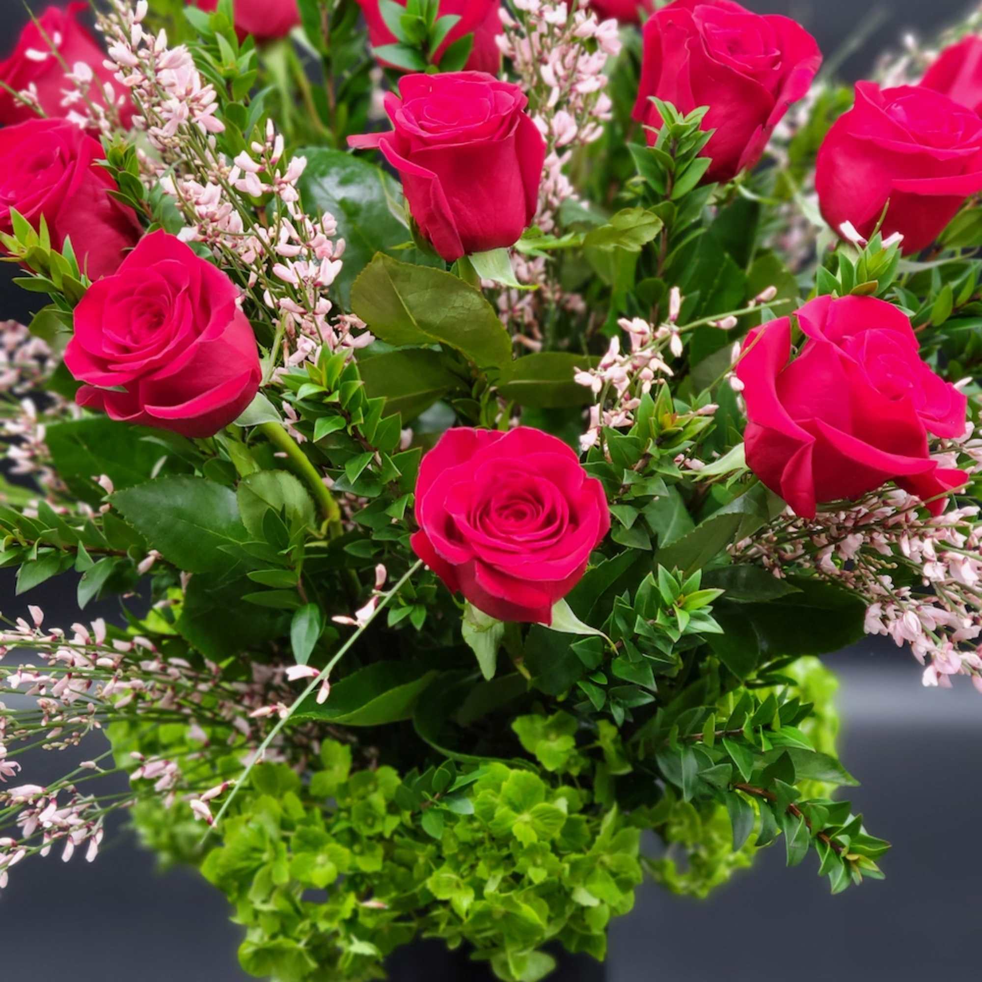 Glass vase will display a burst of exquisite pink roses sure to Glass vase will display a burst of exquisite pink roses sure to