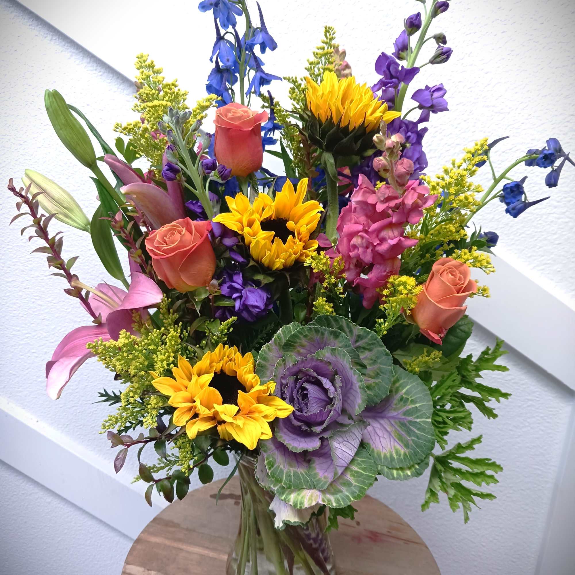This arrangement is a bright mix of flowers hand picked from our This arrangement is a bright mix of flowers hand picked from our