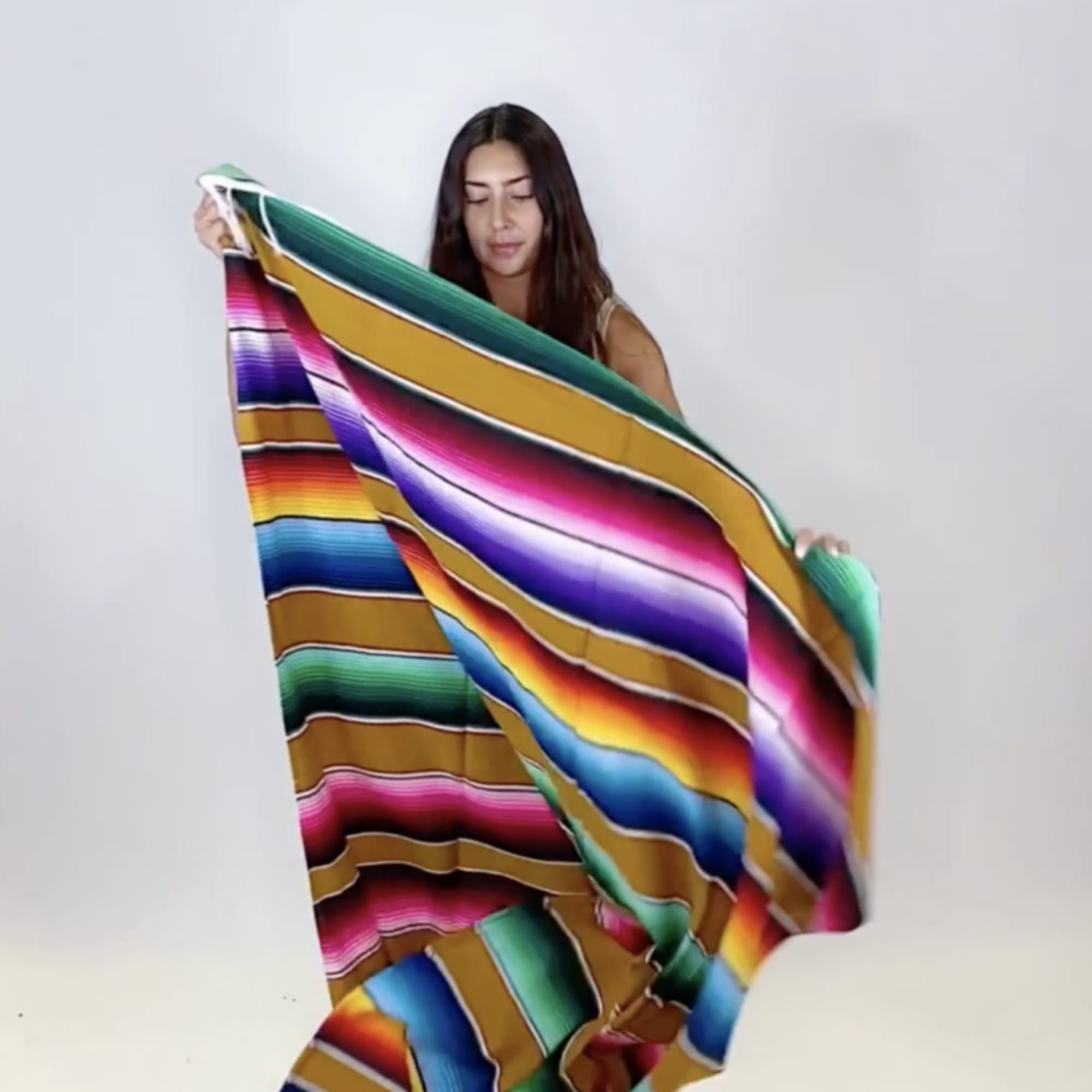 - OFF-WHITE WOVEN TOTE
- DESERT CLAY TONED FLORAL ARRANGEMENT
- CREAM SOMBRERO
- SERAPE