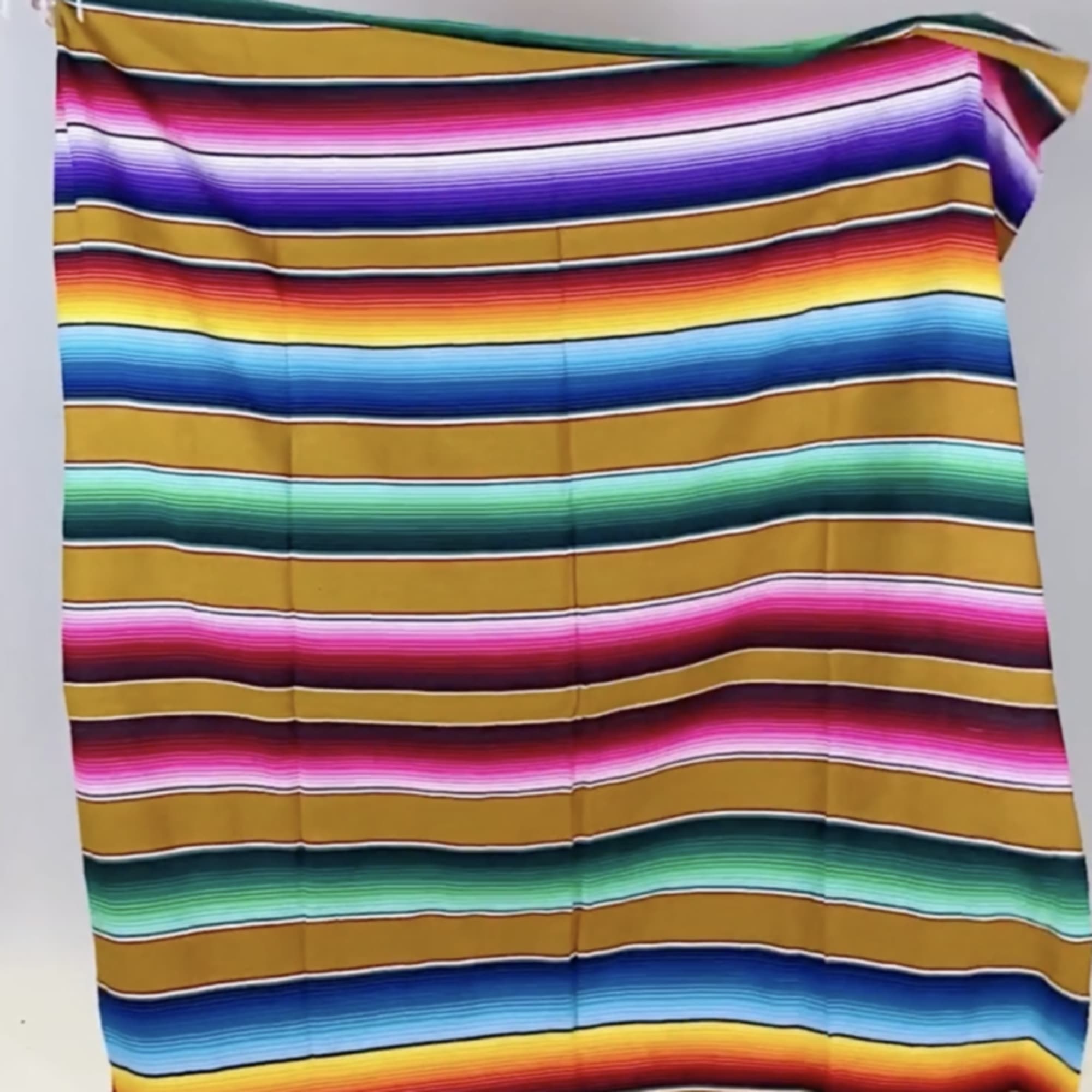 - OFF-WHITE WOVEN TOTE
- DESERT CLAY TONED FLORAL ARRANGEMENT
- CREAM SOMBRERO
- SERAPE