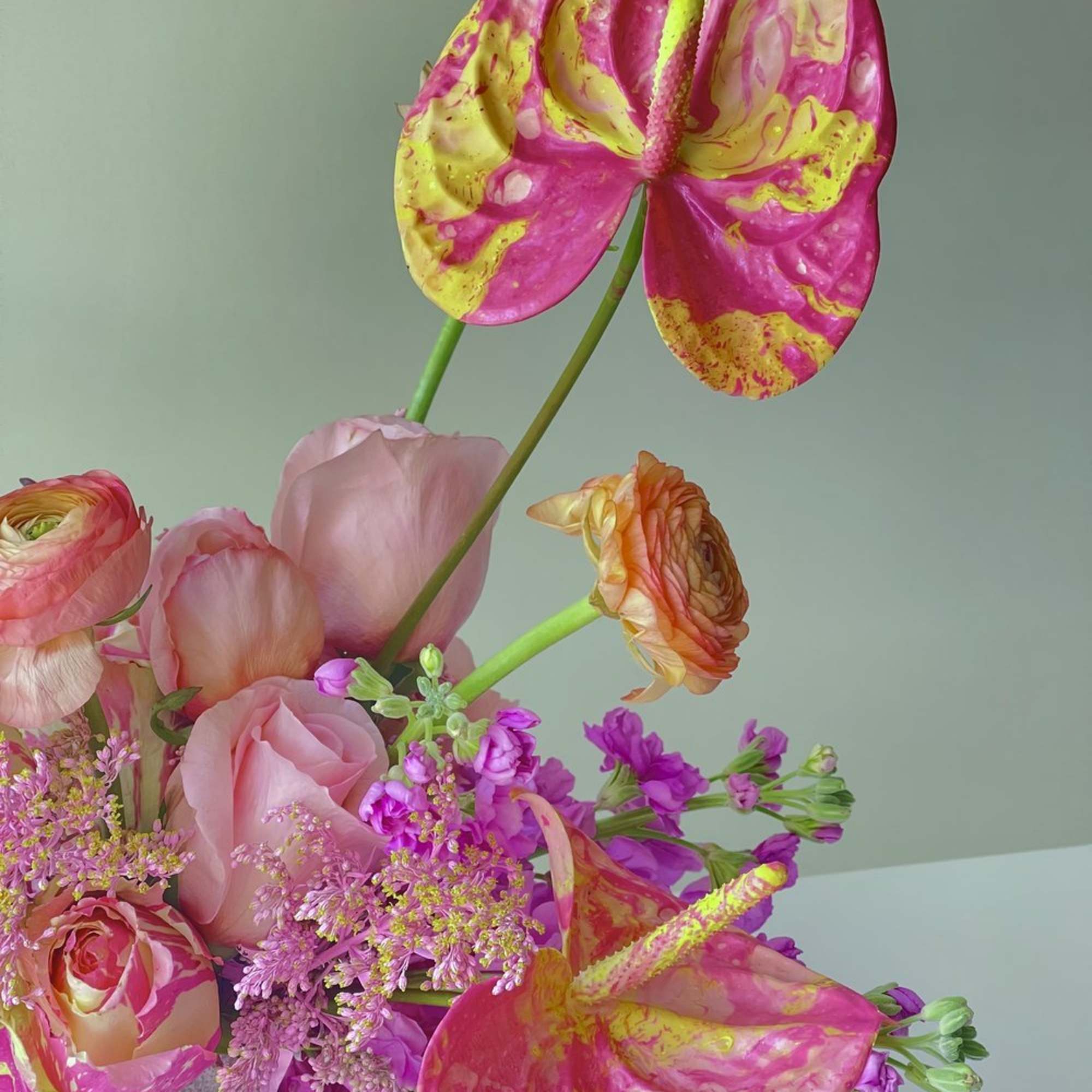 - Lively mix of soft pink florals
- Dynamic, eye-catching design
- Radiates elegance