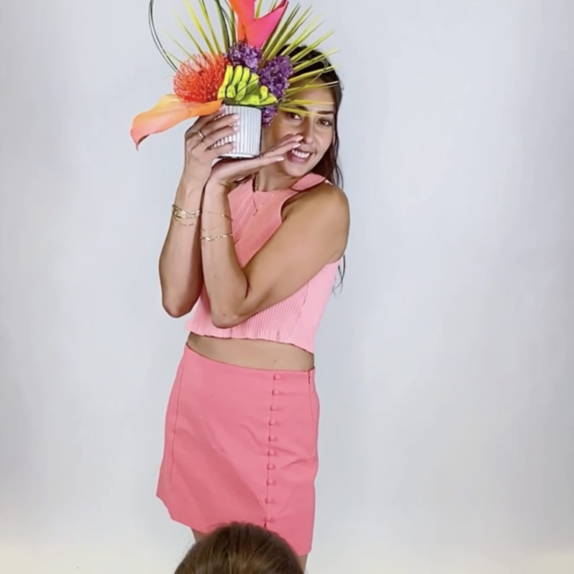 - FLORAL ARRANGEMENTS NEON TROPICAL FLORAL ARRANGEMENT
- OFF-WHITE WOVEN TOTE
- BEACH BLANKET
-