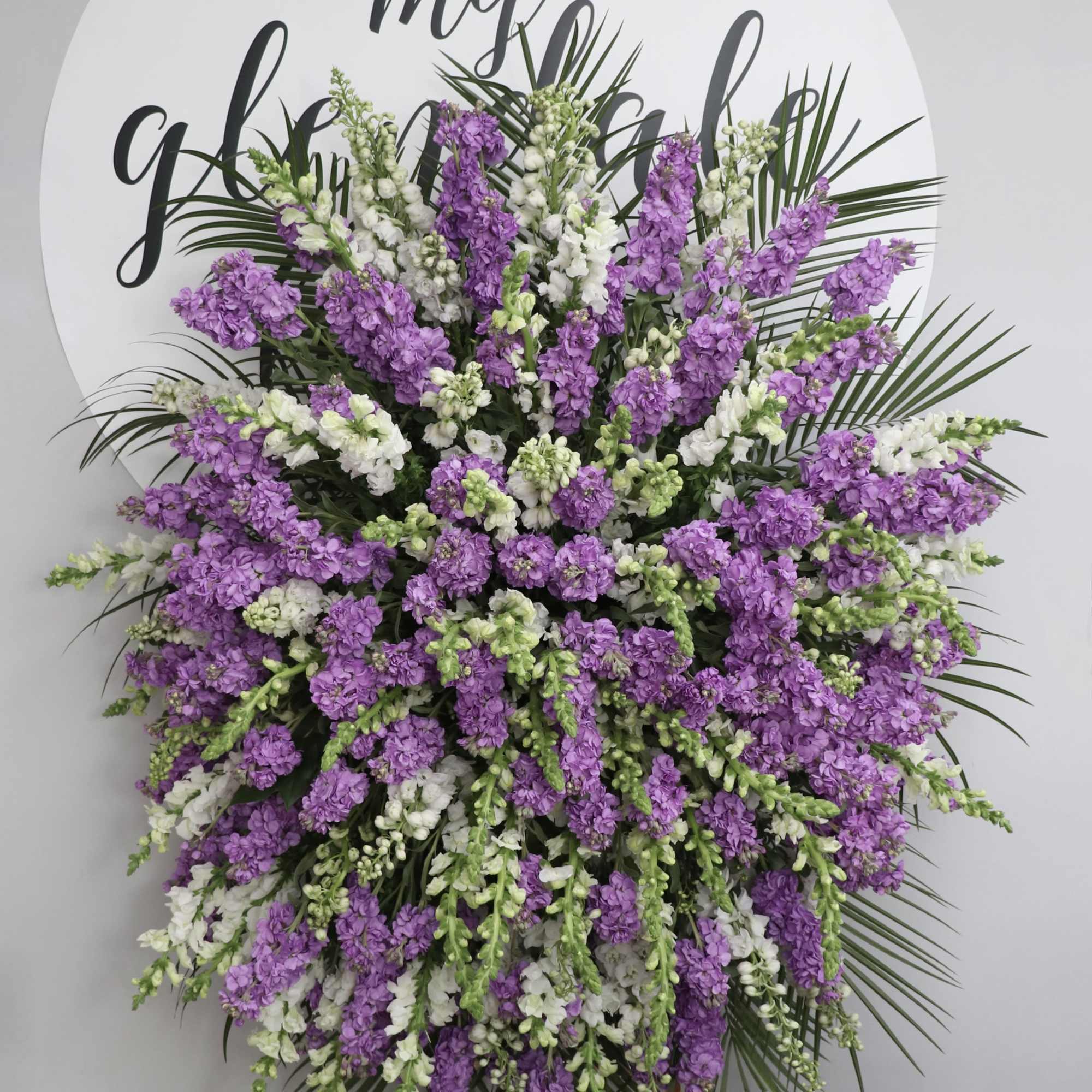 This spray contains a collections of bright lavender and purple stock and