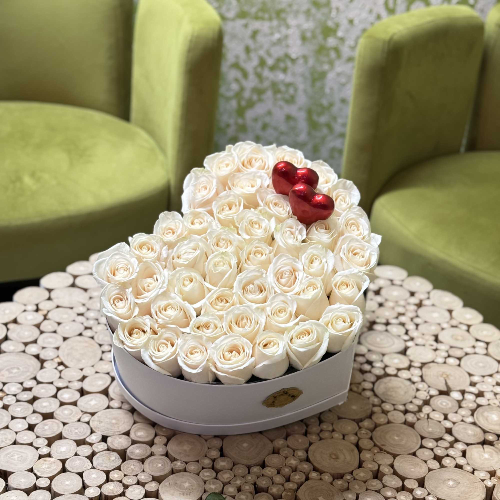 Celebrate Valentine&rsquo;s Day with this exquisite heart-shaped floral arrangement, featuring creamy ivory
