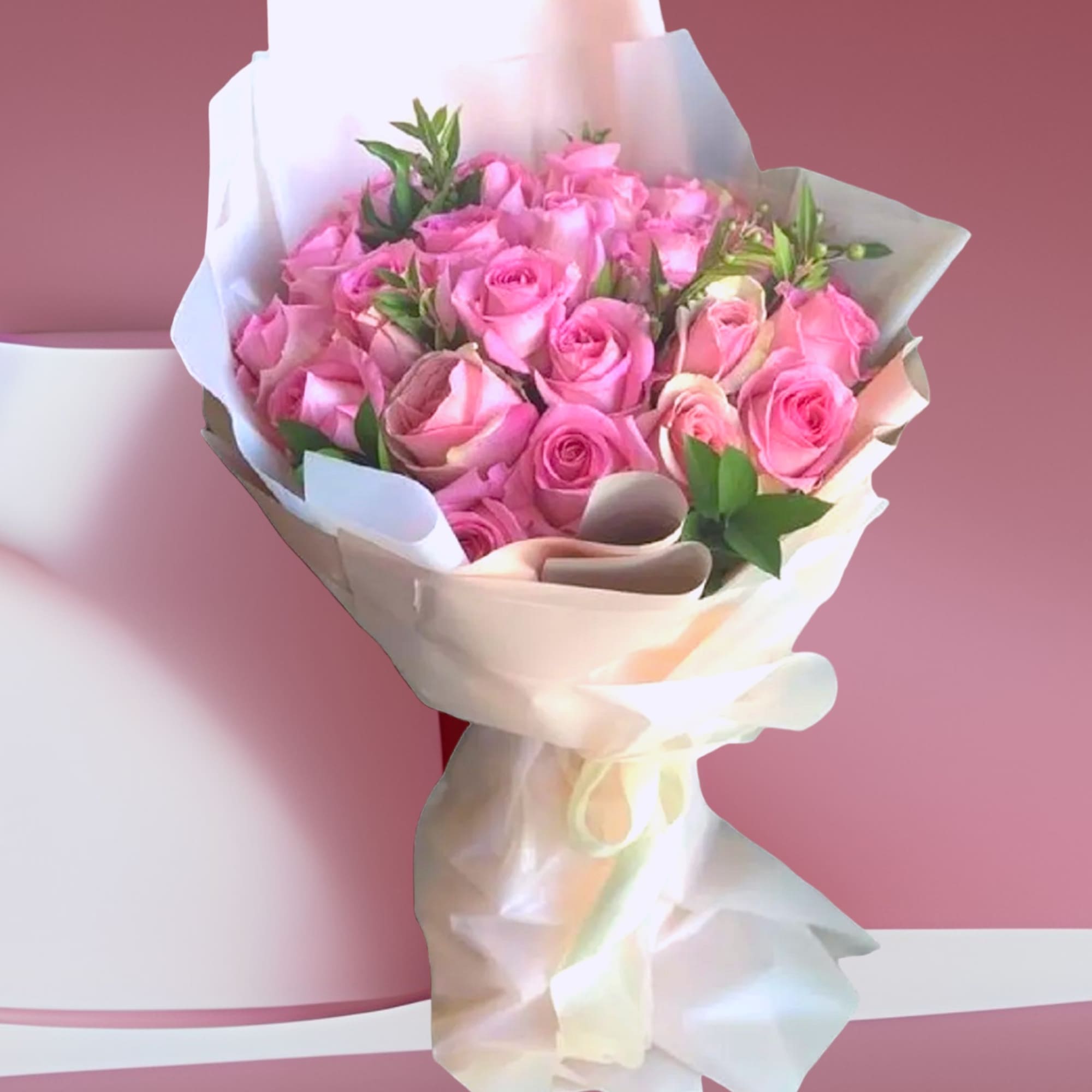 Send this beautiful, wrapped bouquet of pink roses to someone special. Perfect