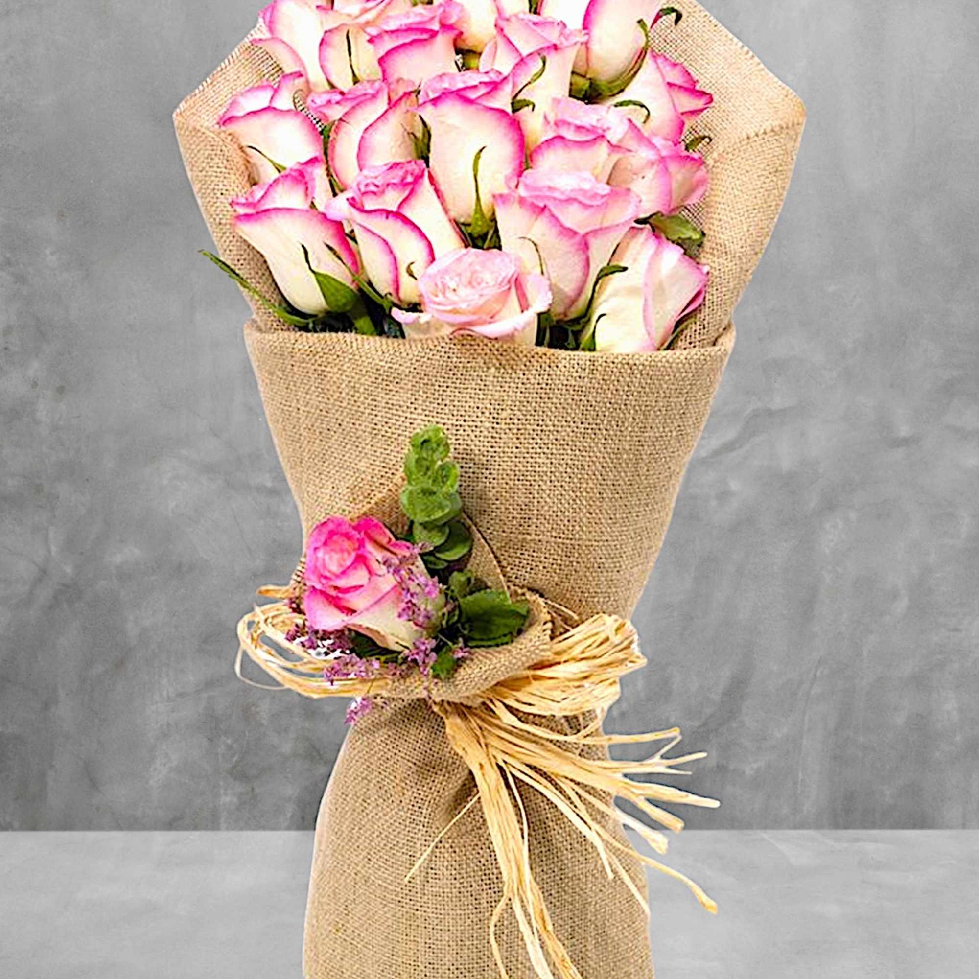 Surprise them with a beautiful bunch of bi-color pink roses.
They&#039;ll be dazzled