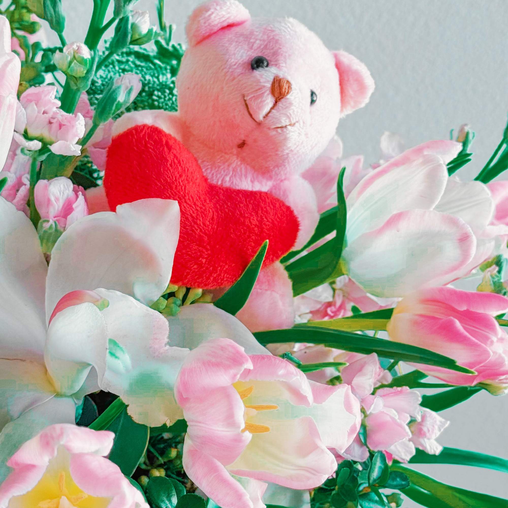 This bouquet is pure sweetness! A mix of soft pink tulips, delicate This bouquet is pure sweetness! A mix of soft pink tulips, delicate