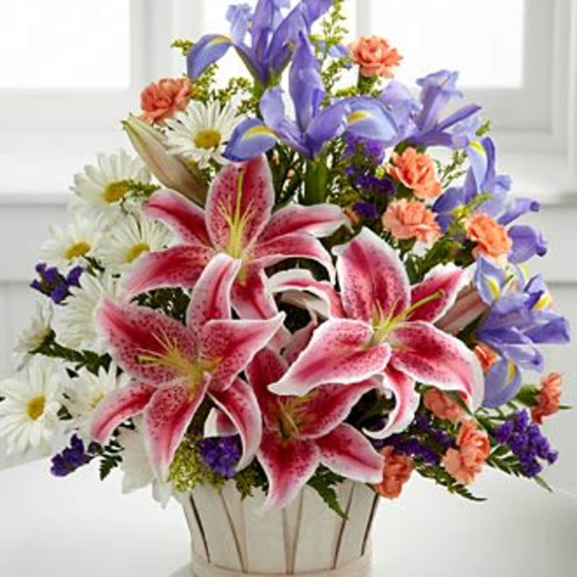Wondrous Nature Bouquet is bountifully bedecked with a dazzling display of color