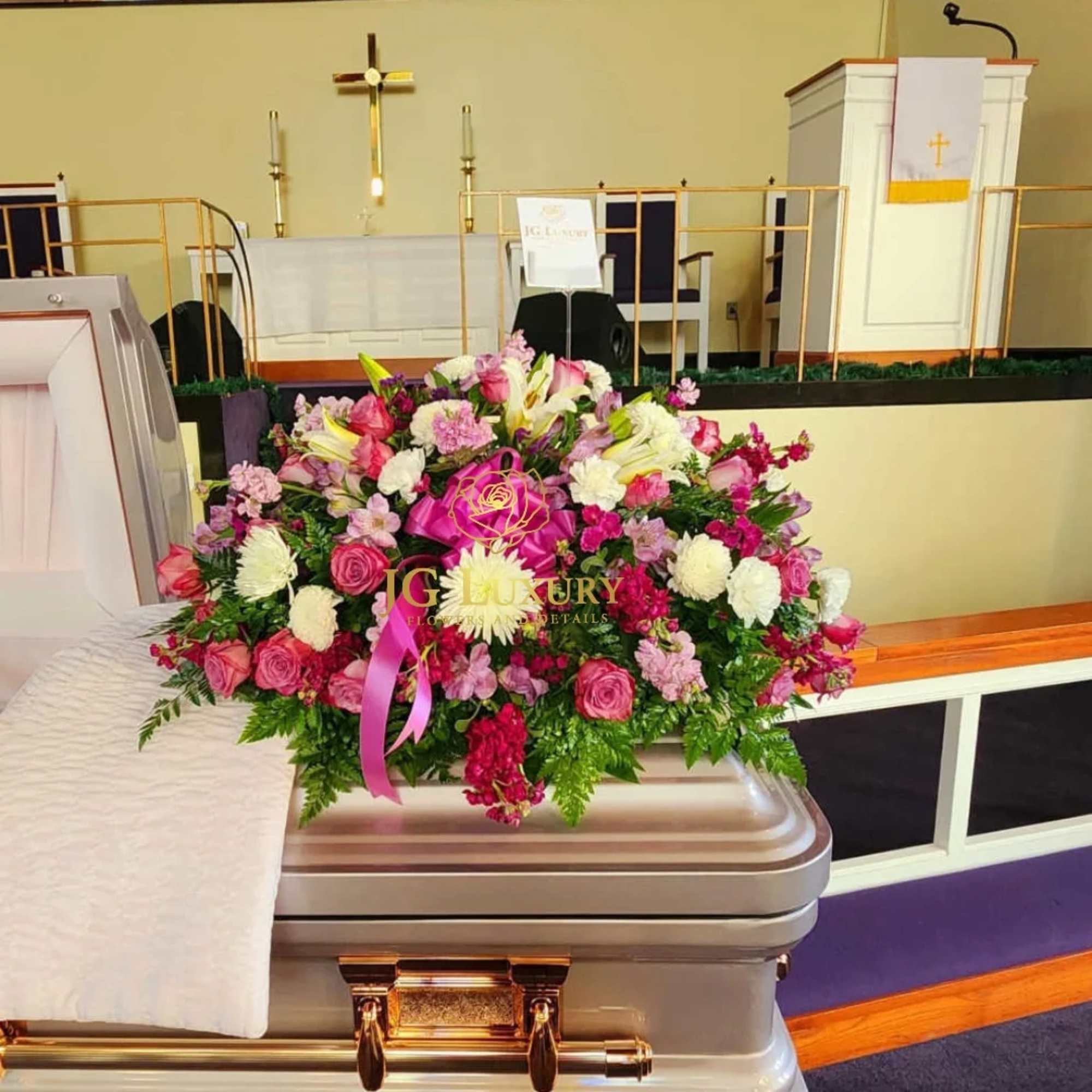 Lovely mix of blooms arranged in a Casket Spray.