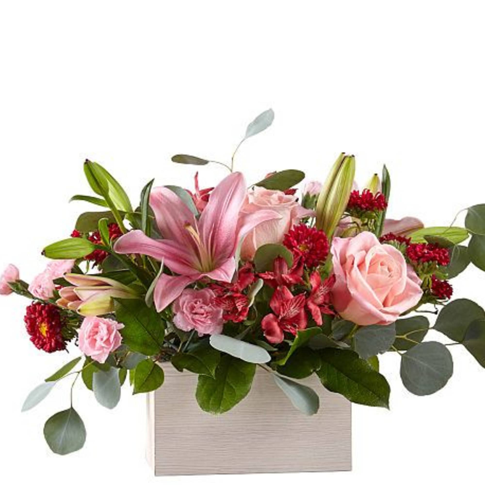 Timeless blooms and classic Valentine shades create the Head Over Heels Bouquet.