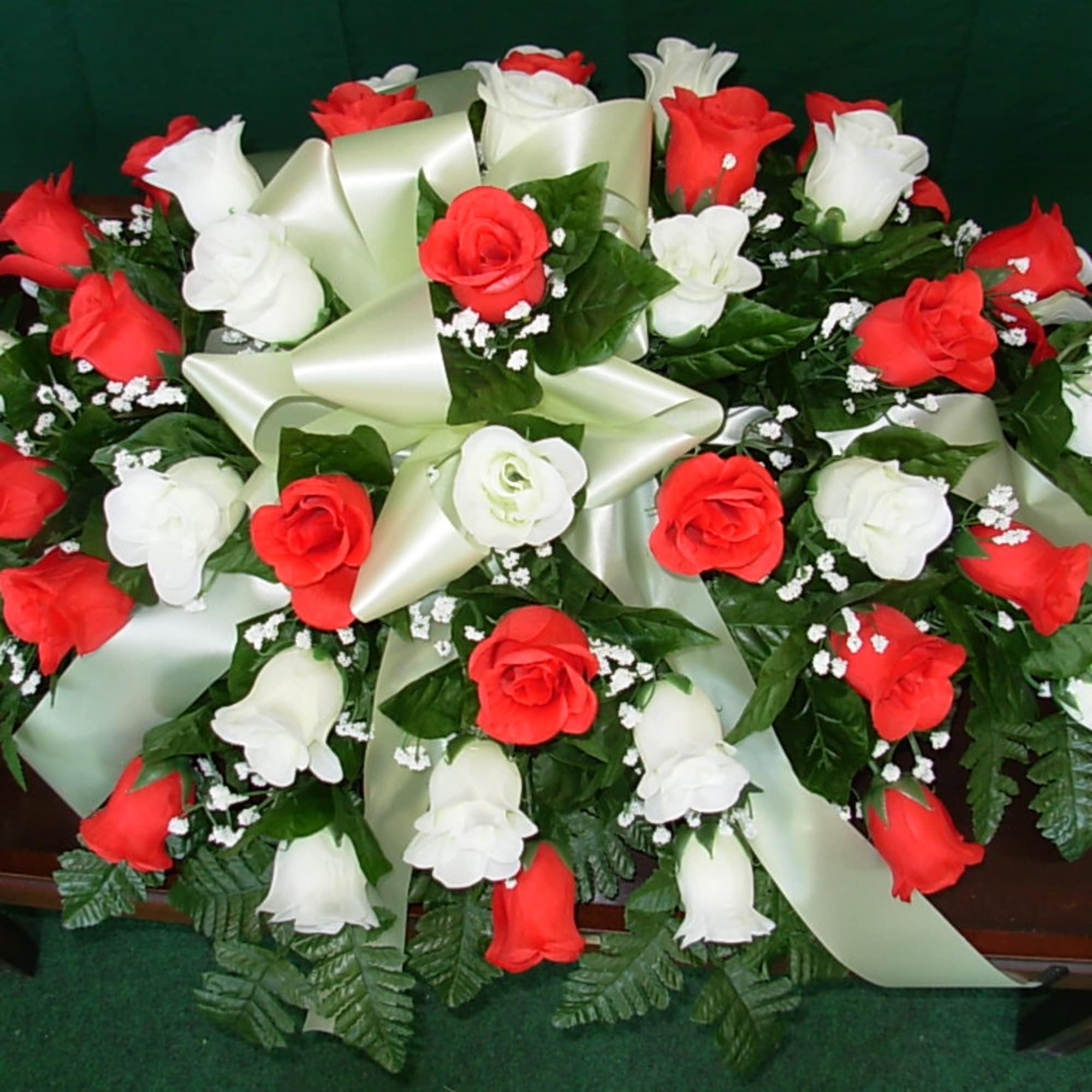  OUR SILK-PERMANENT RED AND WHITE ALL ROSE BUD CASKET SPRAY 
