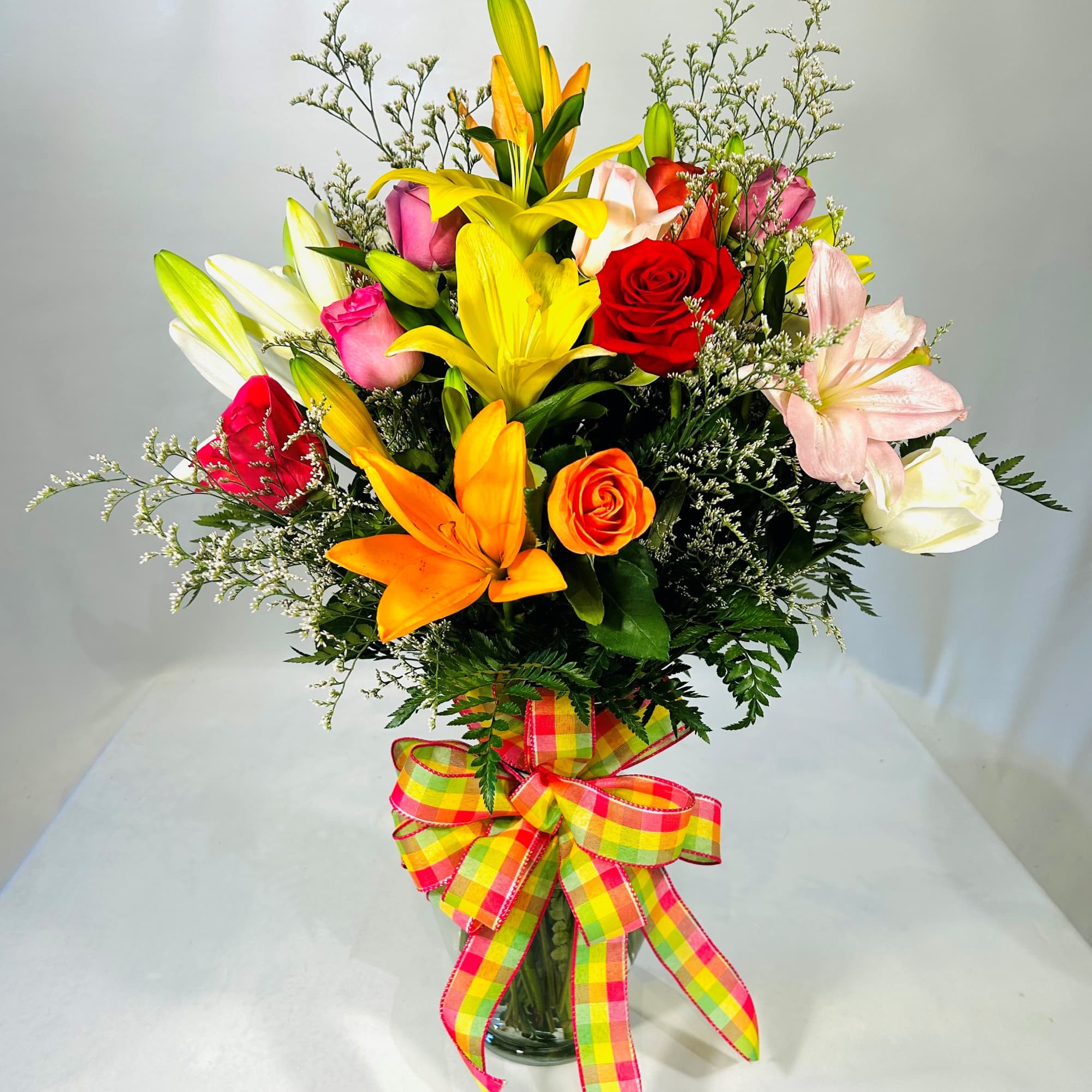 Our stylish twist on a traditional design makes this a beautiful bouquet. Our stylish twist on a traditional design makes this a beautiful bouquet.