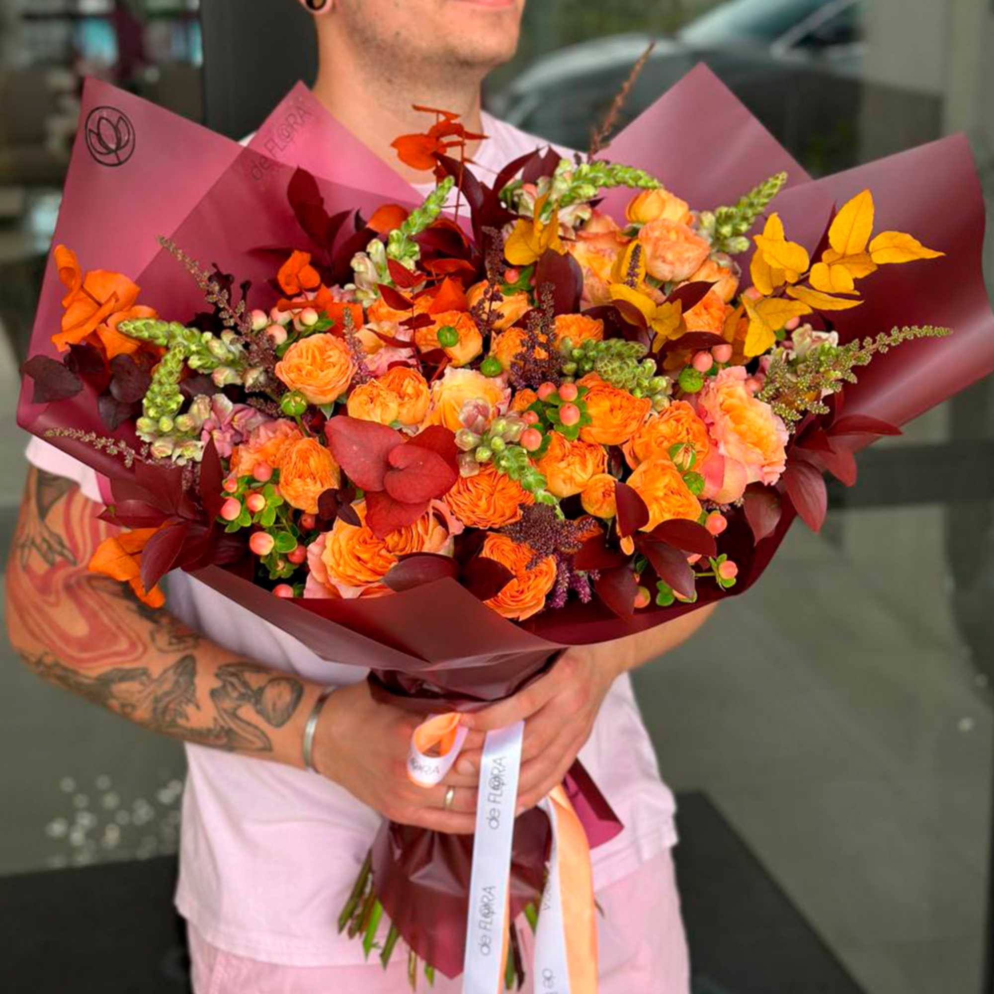 Bouquet of spray garden roses, premium roses, hypericum, astilbe, eucalyptus and ruscus. Bouquet of spray garden roses, premium roses, hypericum, astilbe, eucalyptus and ruscus.